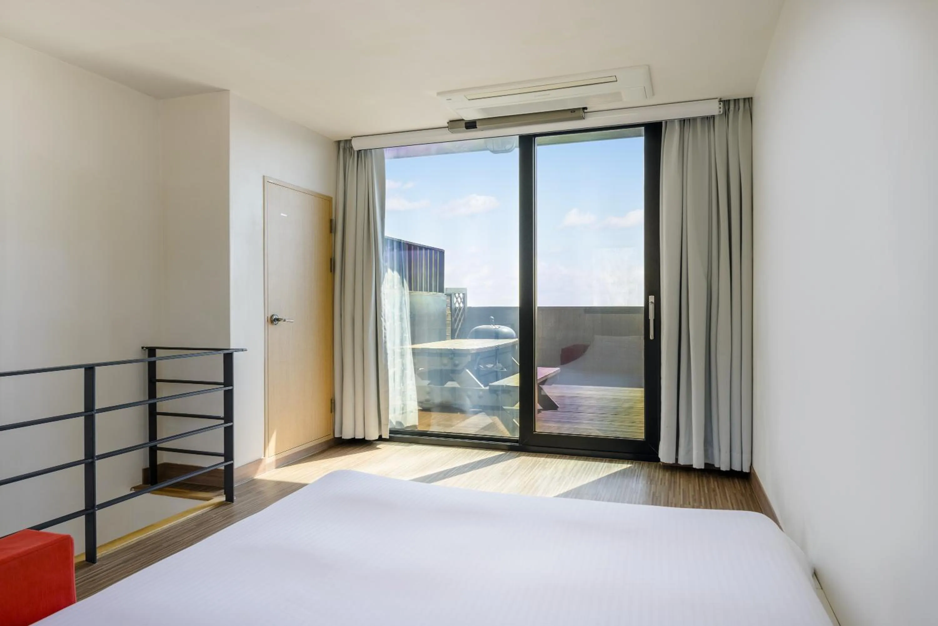 Balcony/Terrace, Bed in IRO Jeju