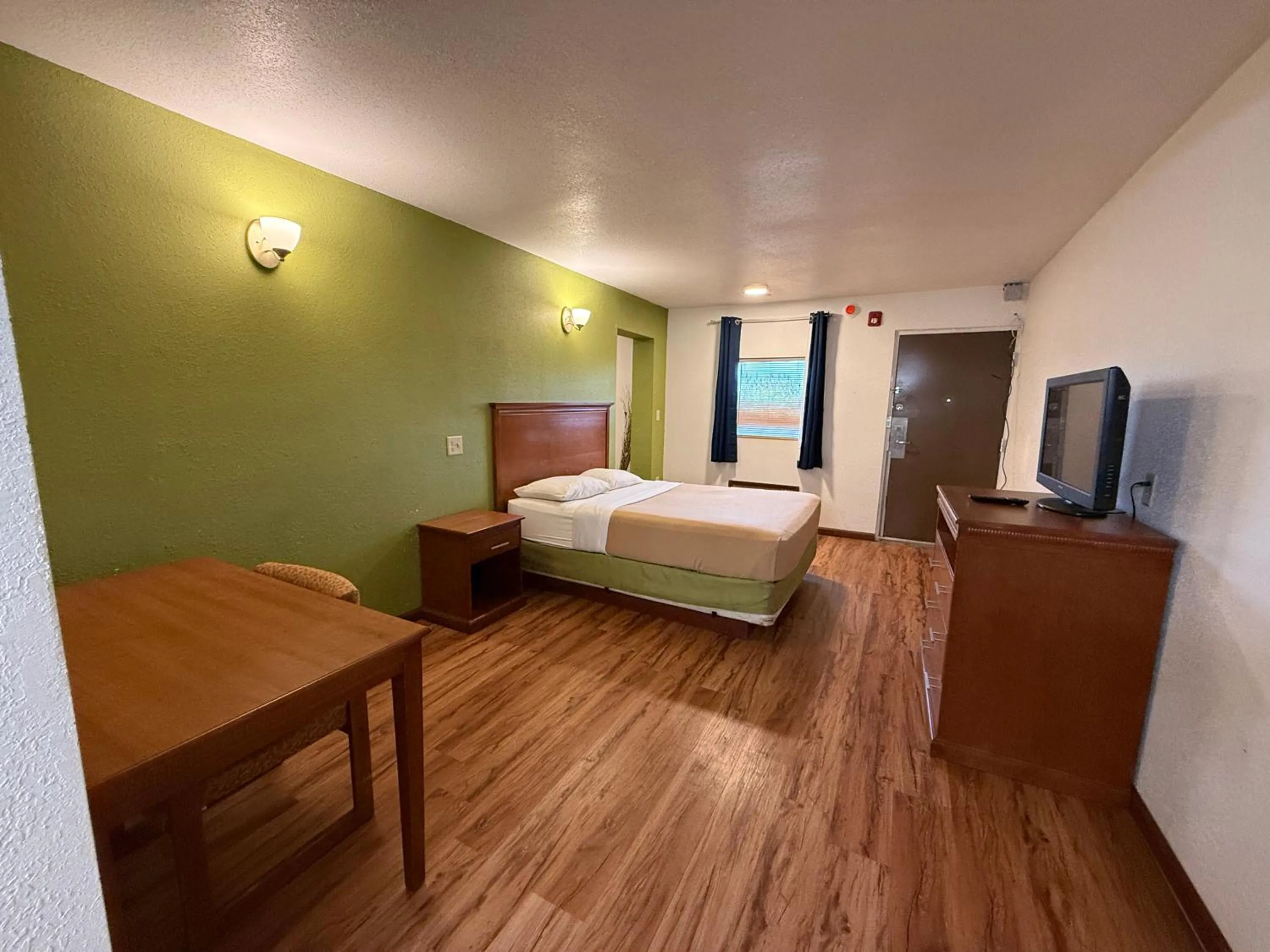 Bed in Relax Inn & Suites