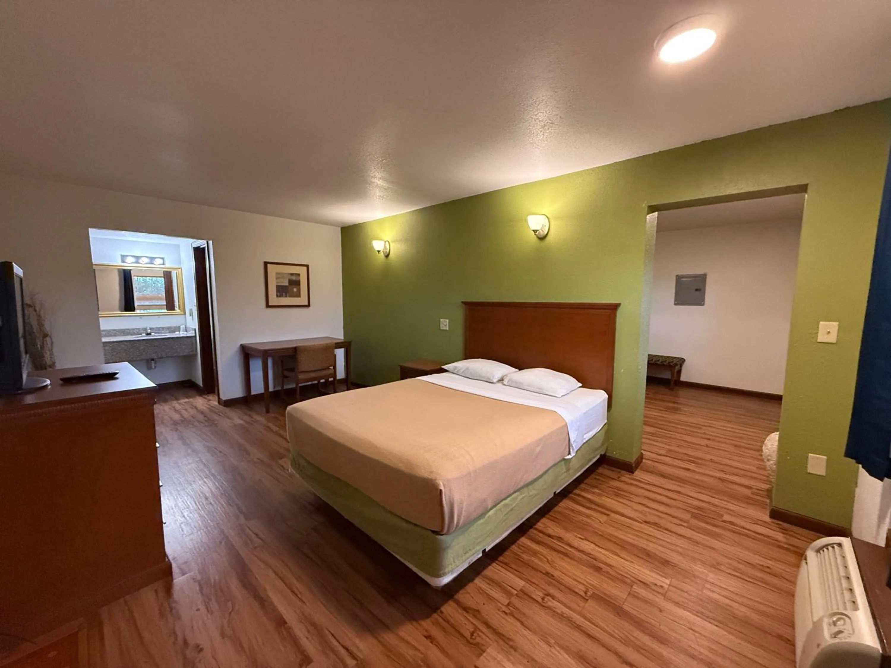 Bed in Relax Inn & Suites