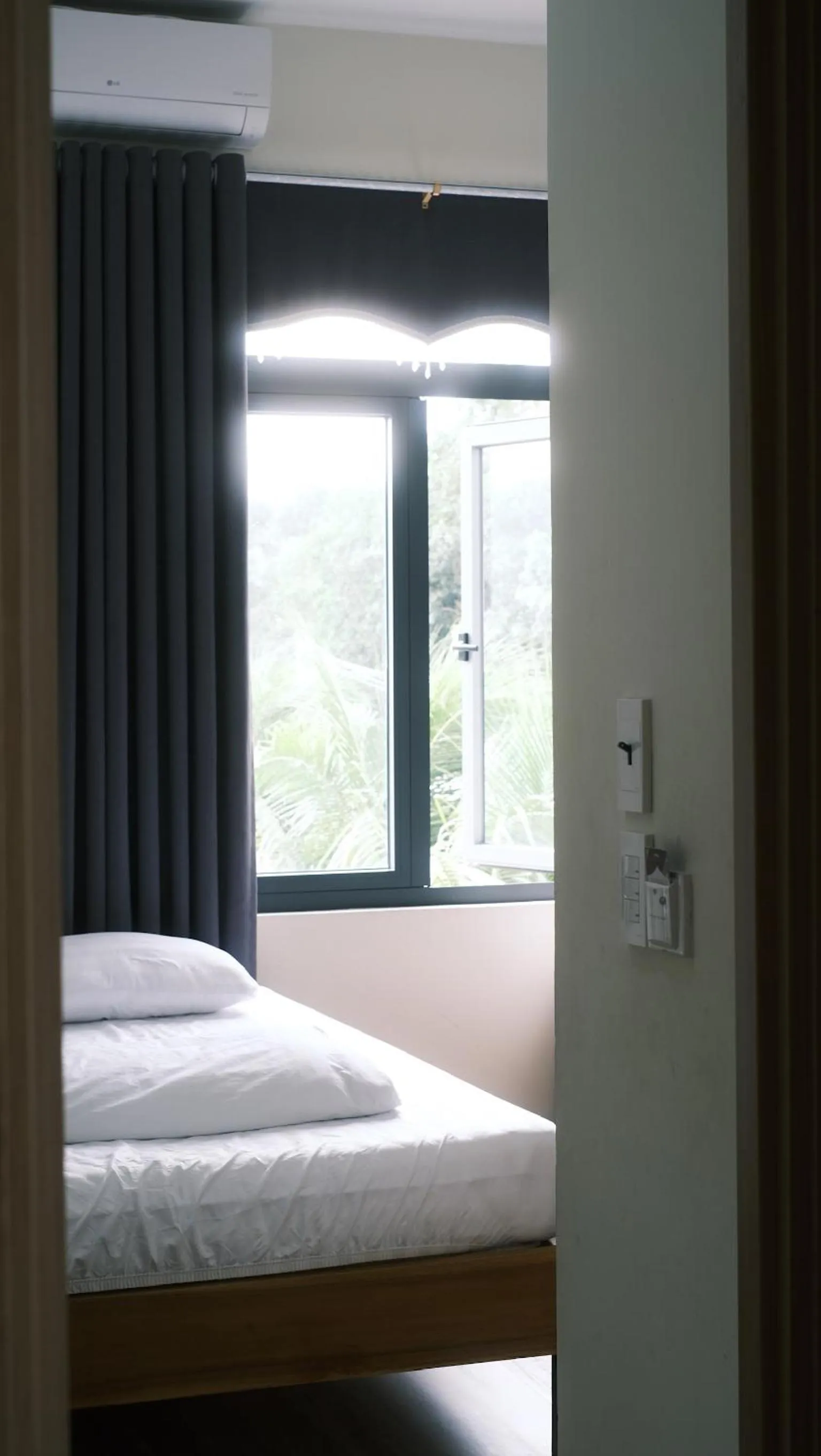 Photo of the whole room, Bed in Hoàng Đô Hotel