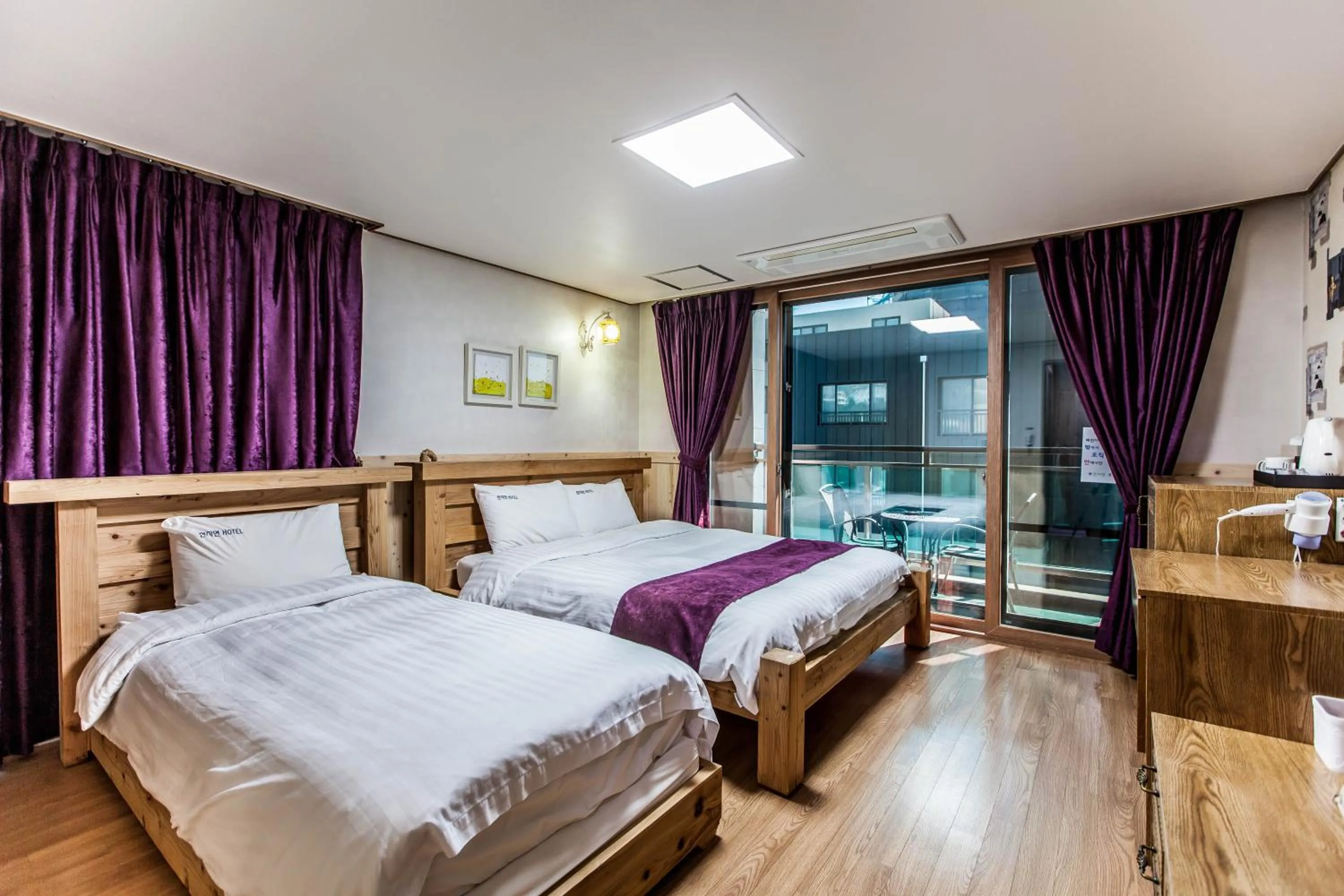 Bed in Cheonjiyeon Hotel