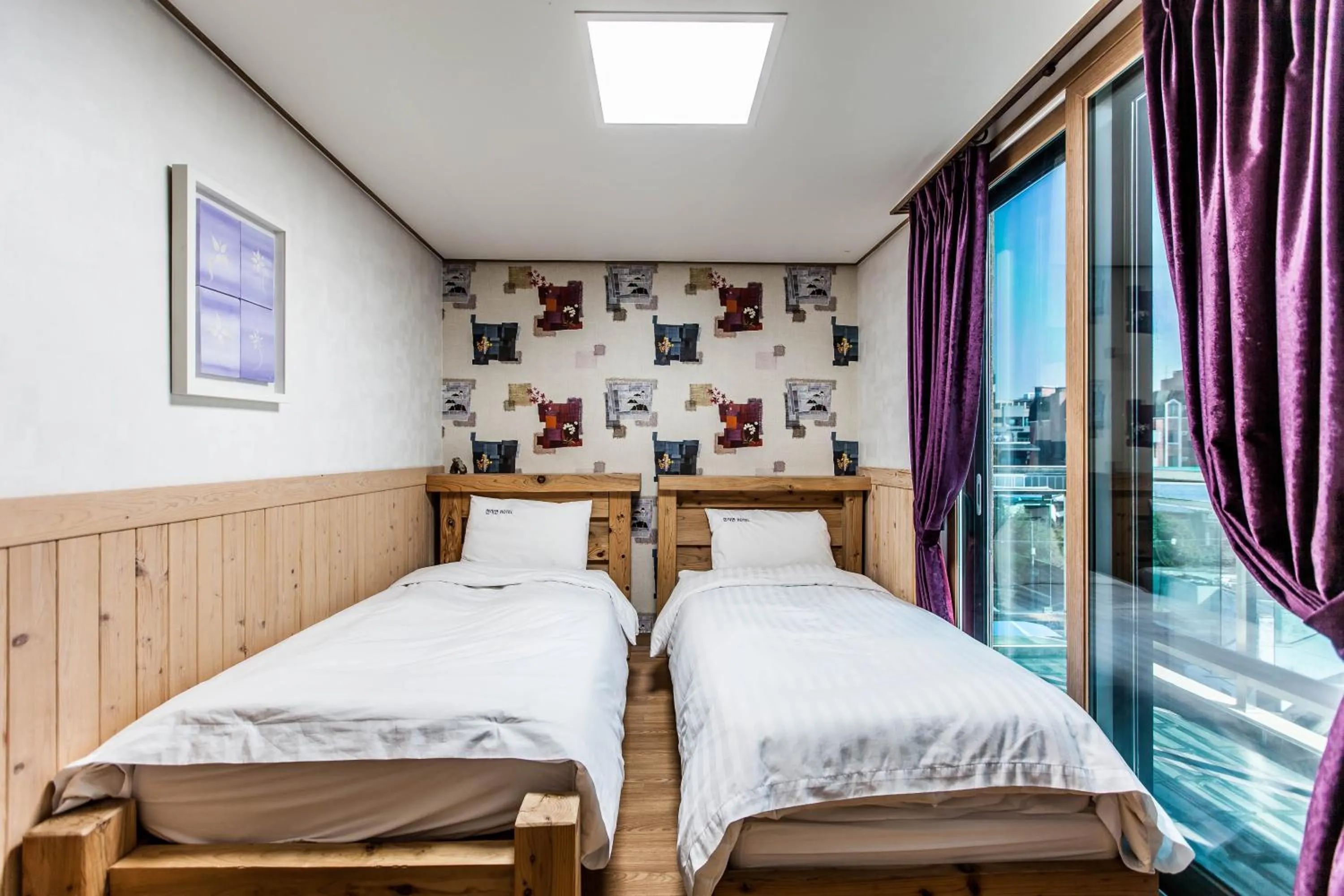 Bed in Cheonjiyeon Hotel