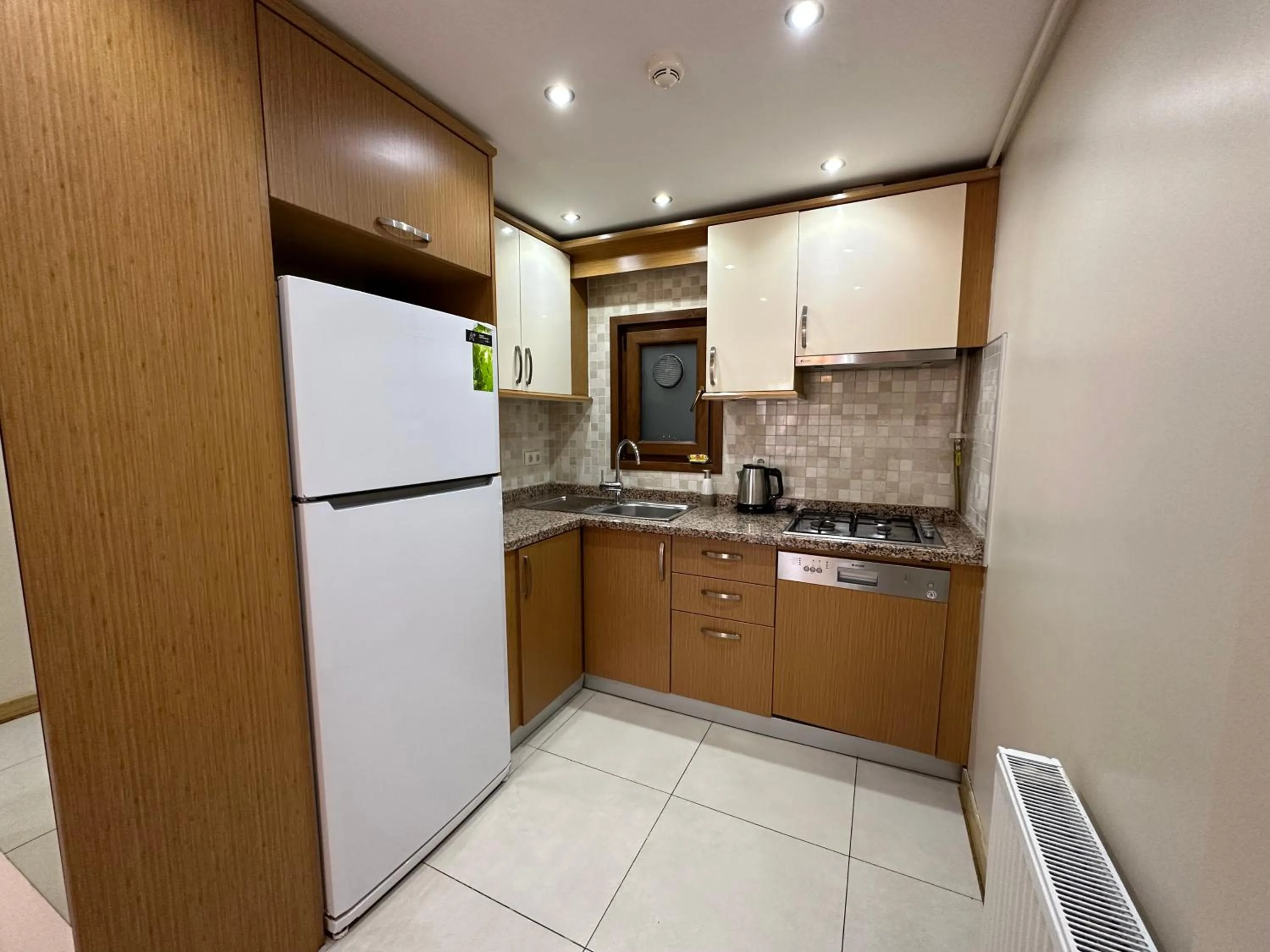 Kitchen or kitchenette in Homelike Residence