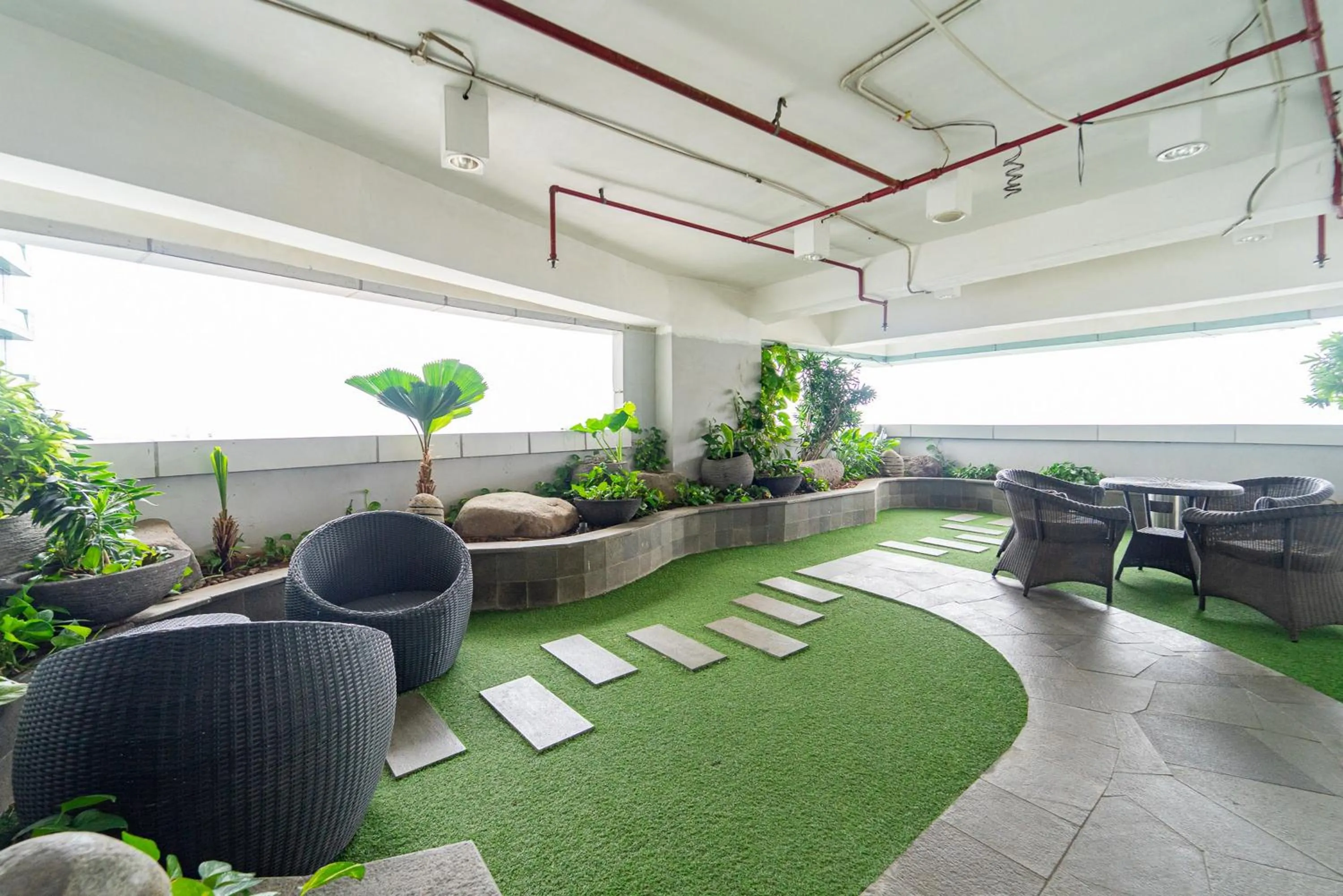 Property building in RedLiving Apartemen Grand Kamala Lagoon - Rooms 911 Tower Barclay South with Netflix