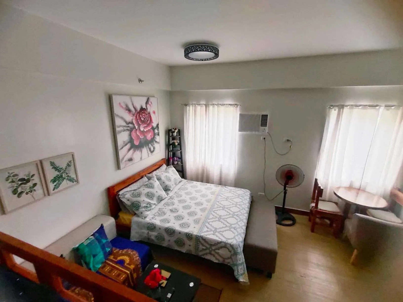 Bed in Happy Stays B - End Unit Greenery View at SMDC Hope Residences