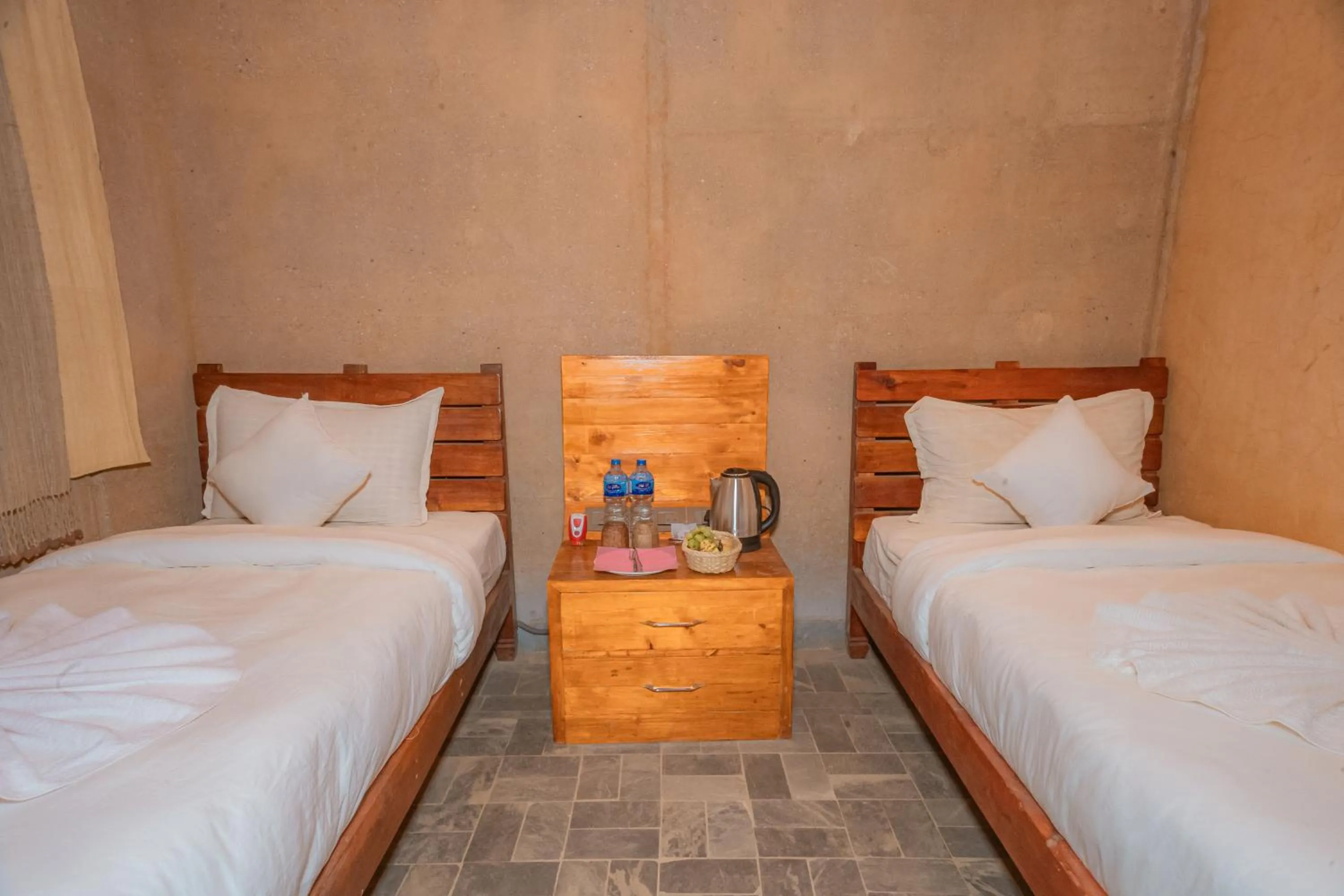 Bed in Bagaicha Adventure Resort