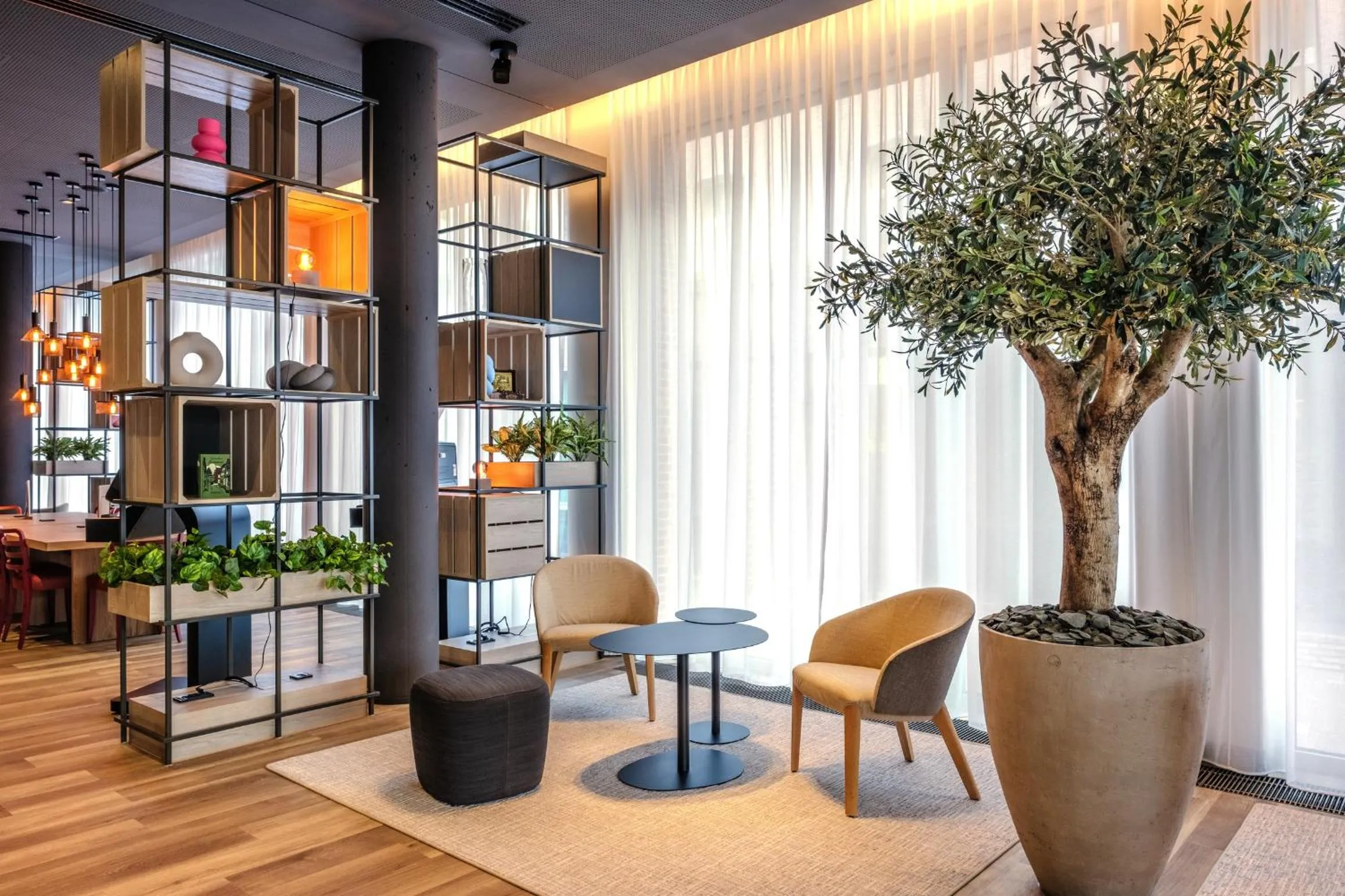 Lobby or reception in IntercityHotel Lübeck