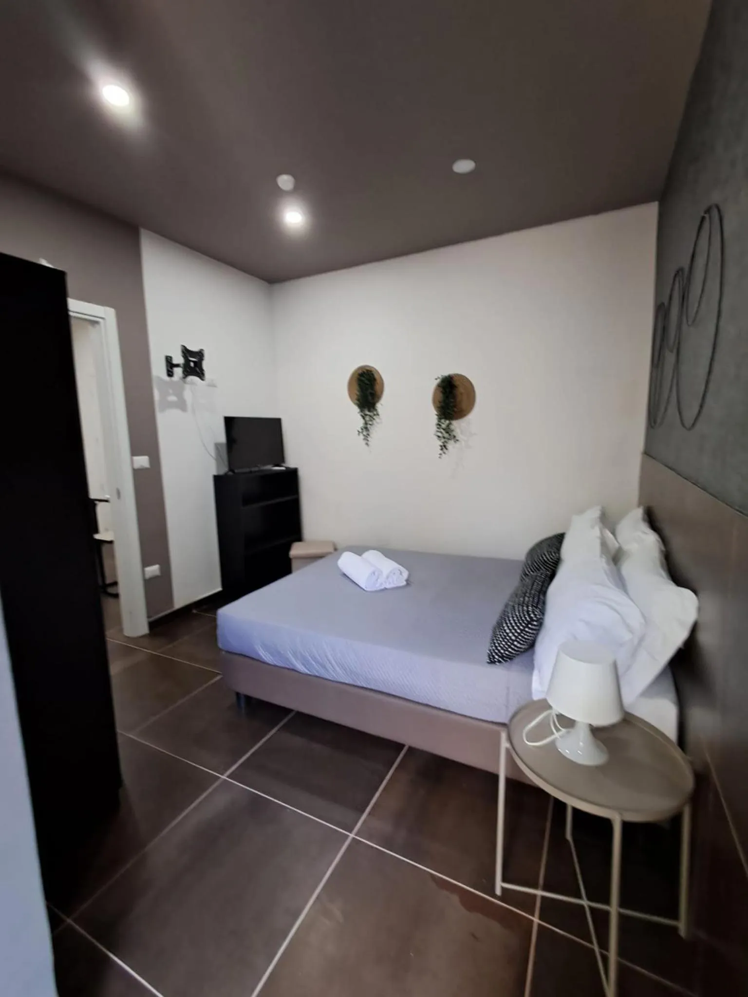 Bed in Hotel apartments Crisvan