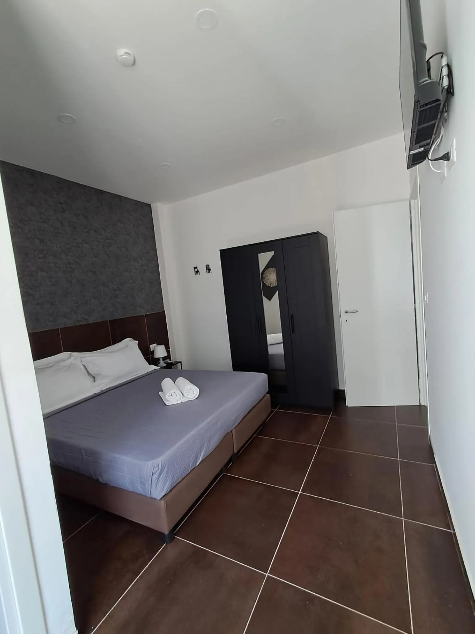 Bed in Hotel apartments Crisvan