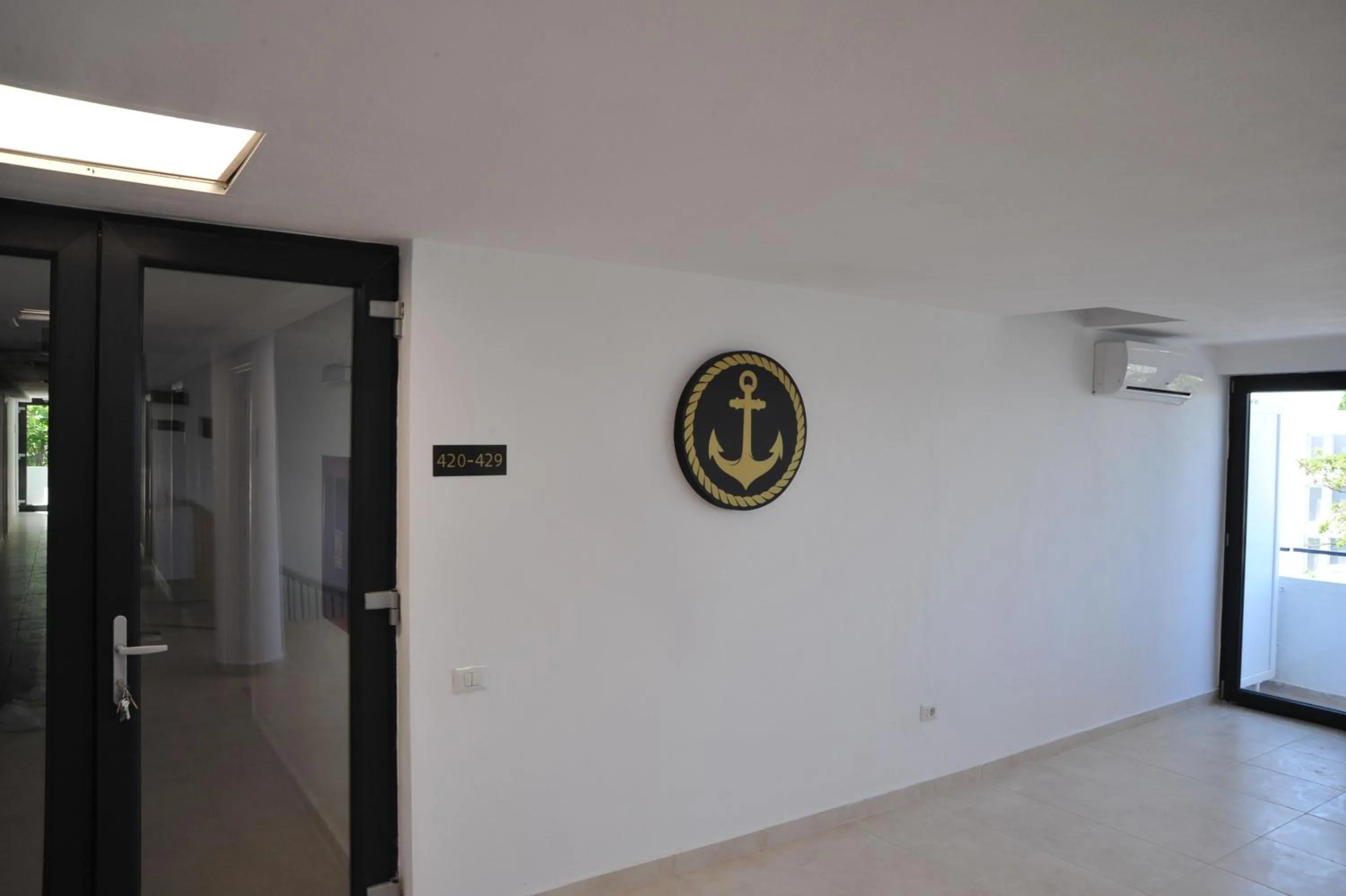 Property logo or sign in Hotel Ancora