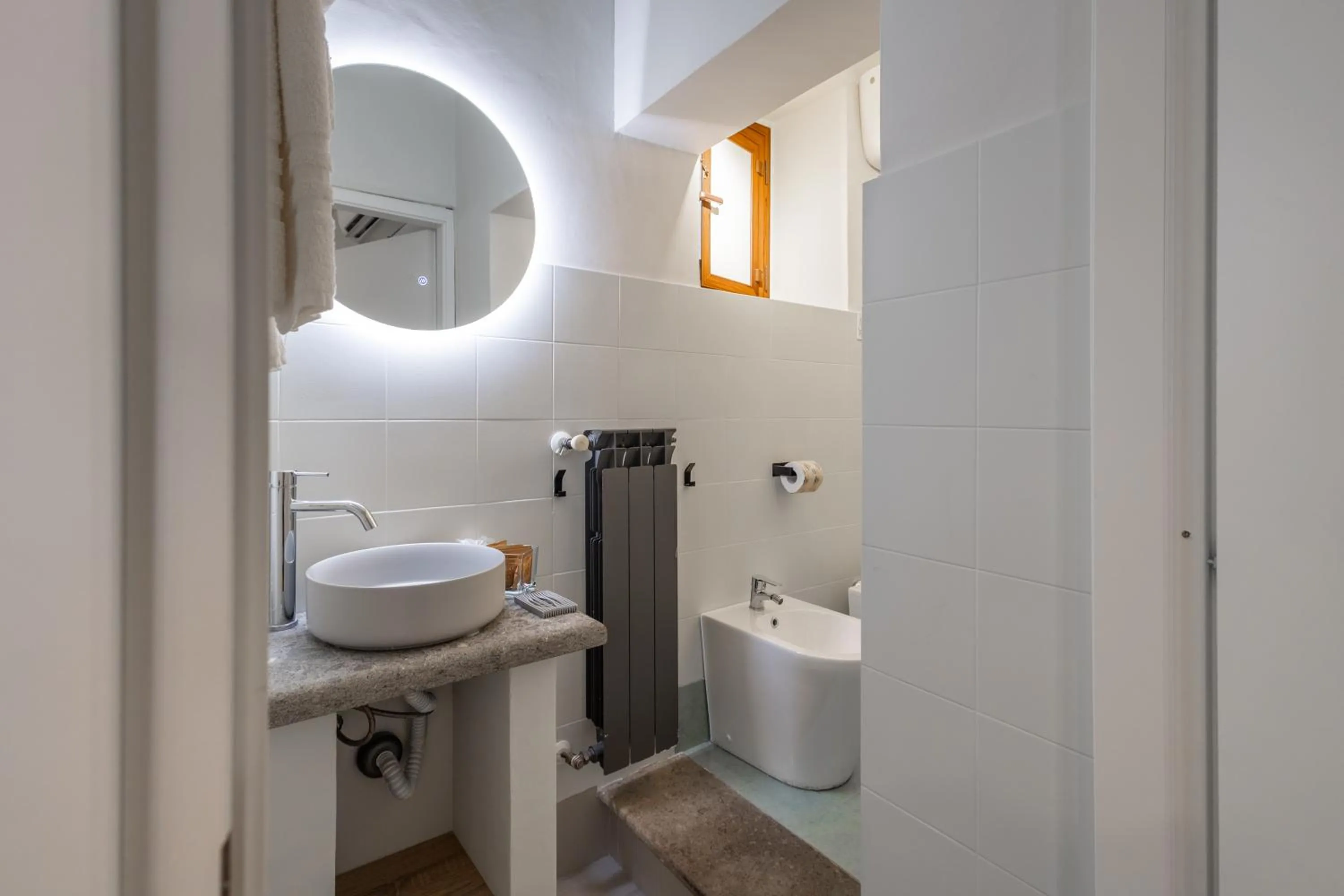 Bathroom in SOHO Piaggiarelle by Dasso - Guest House