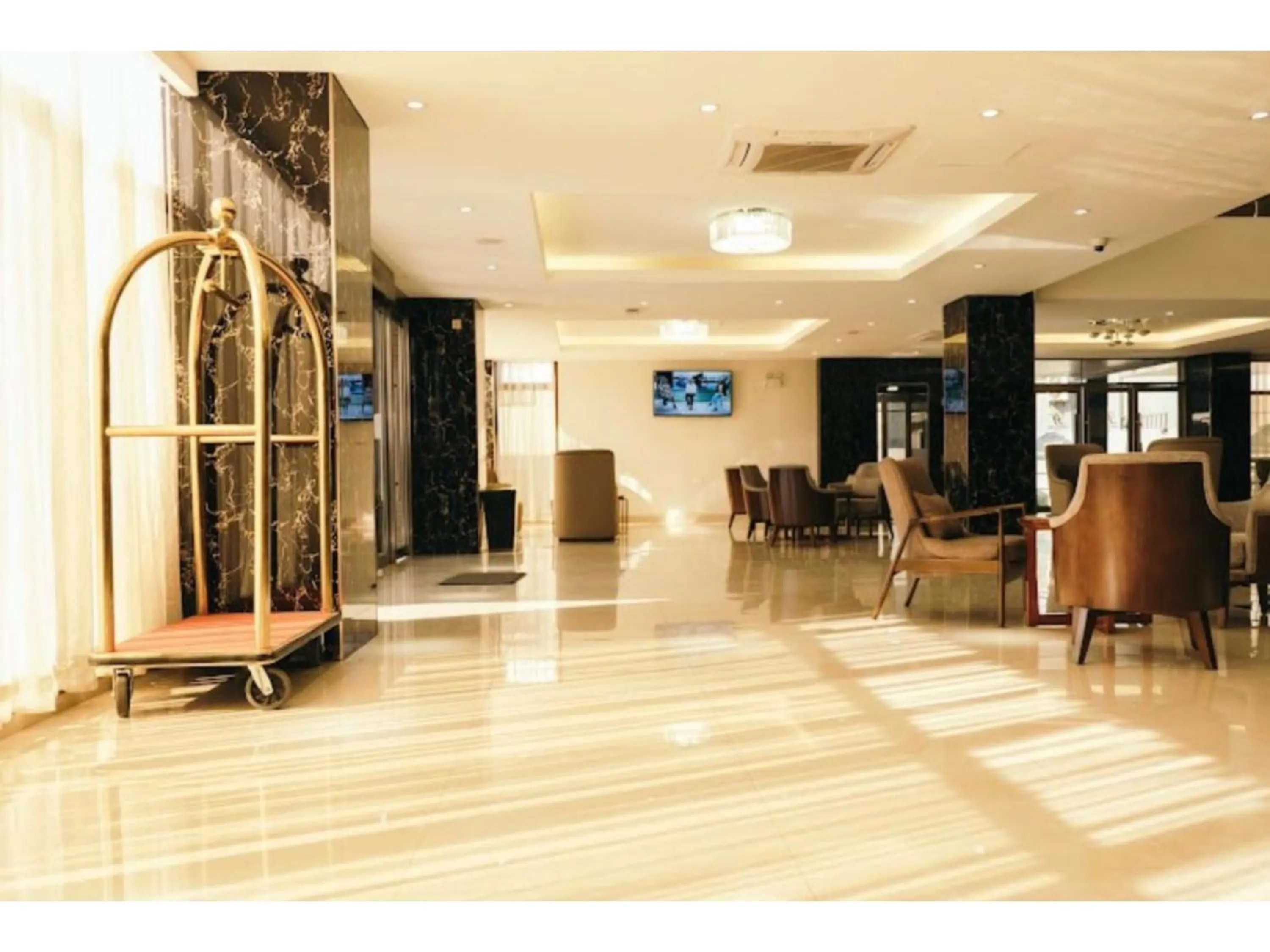 Communal lounge/ TV room in Grand Palace Hotel Lusaka