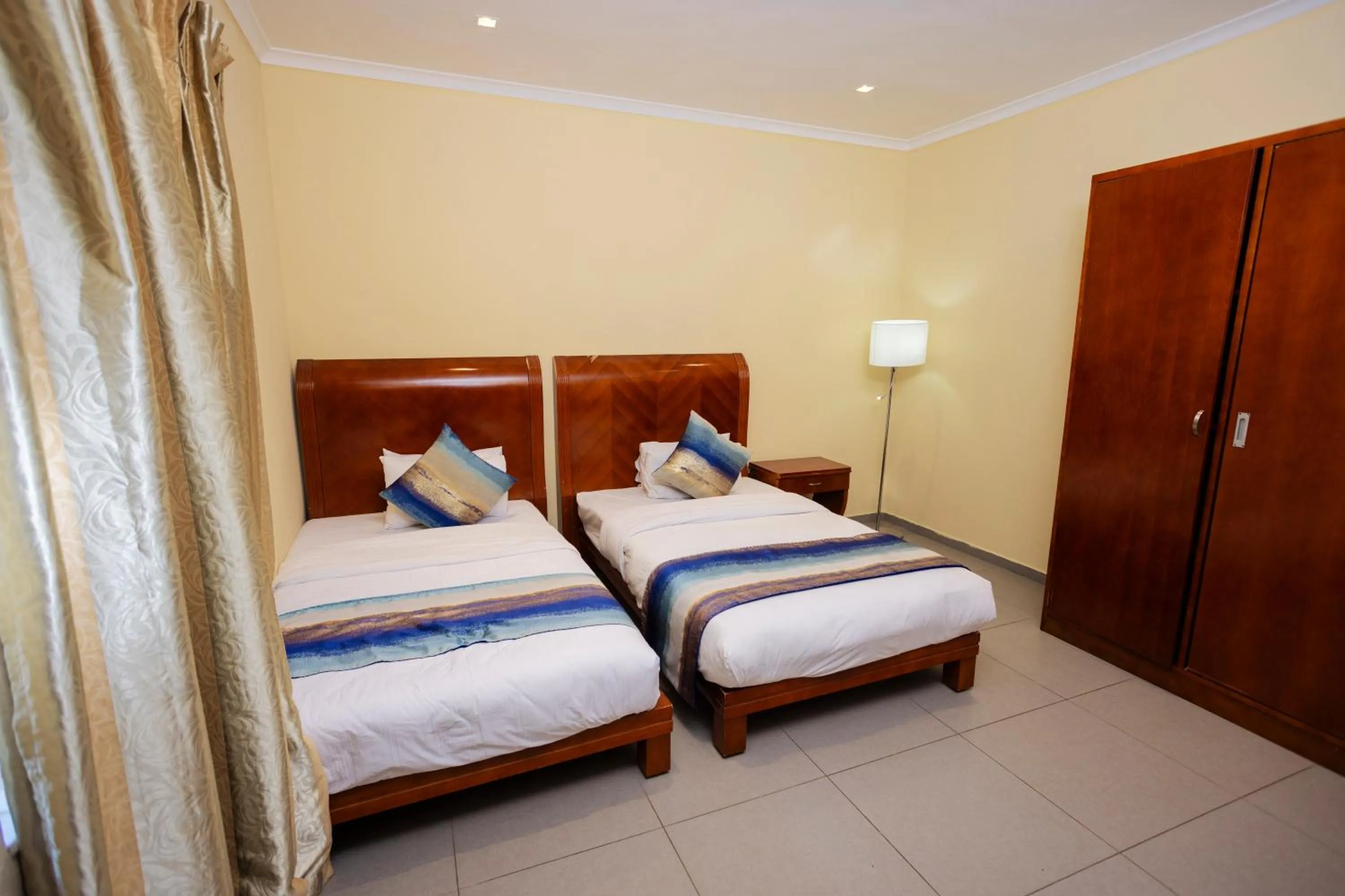 Bed in Grand Palace Hotel Lusaka