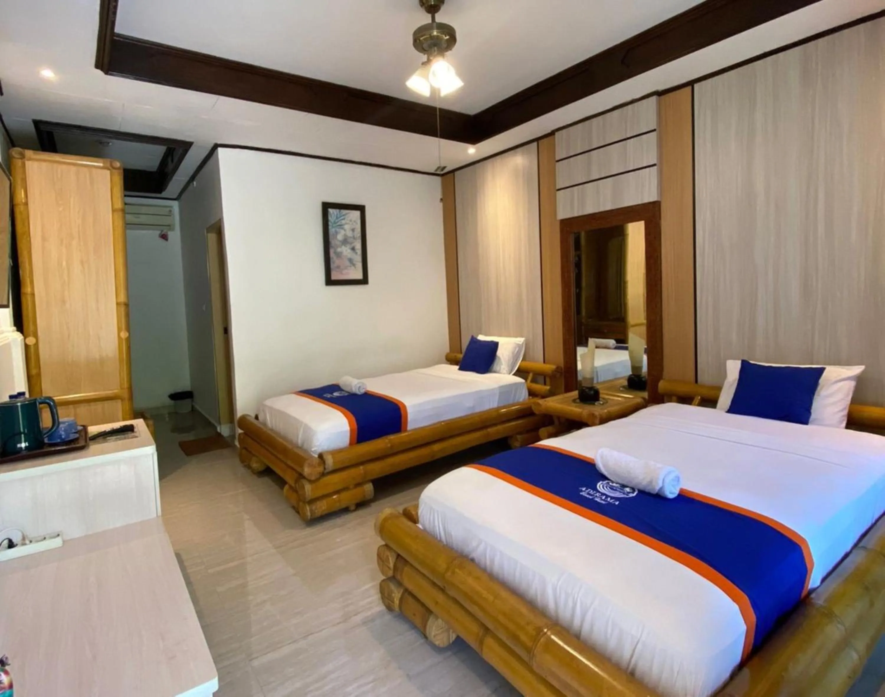 Bed in New Adirama Beach Hotel