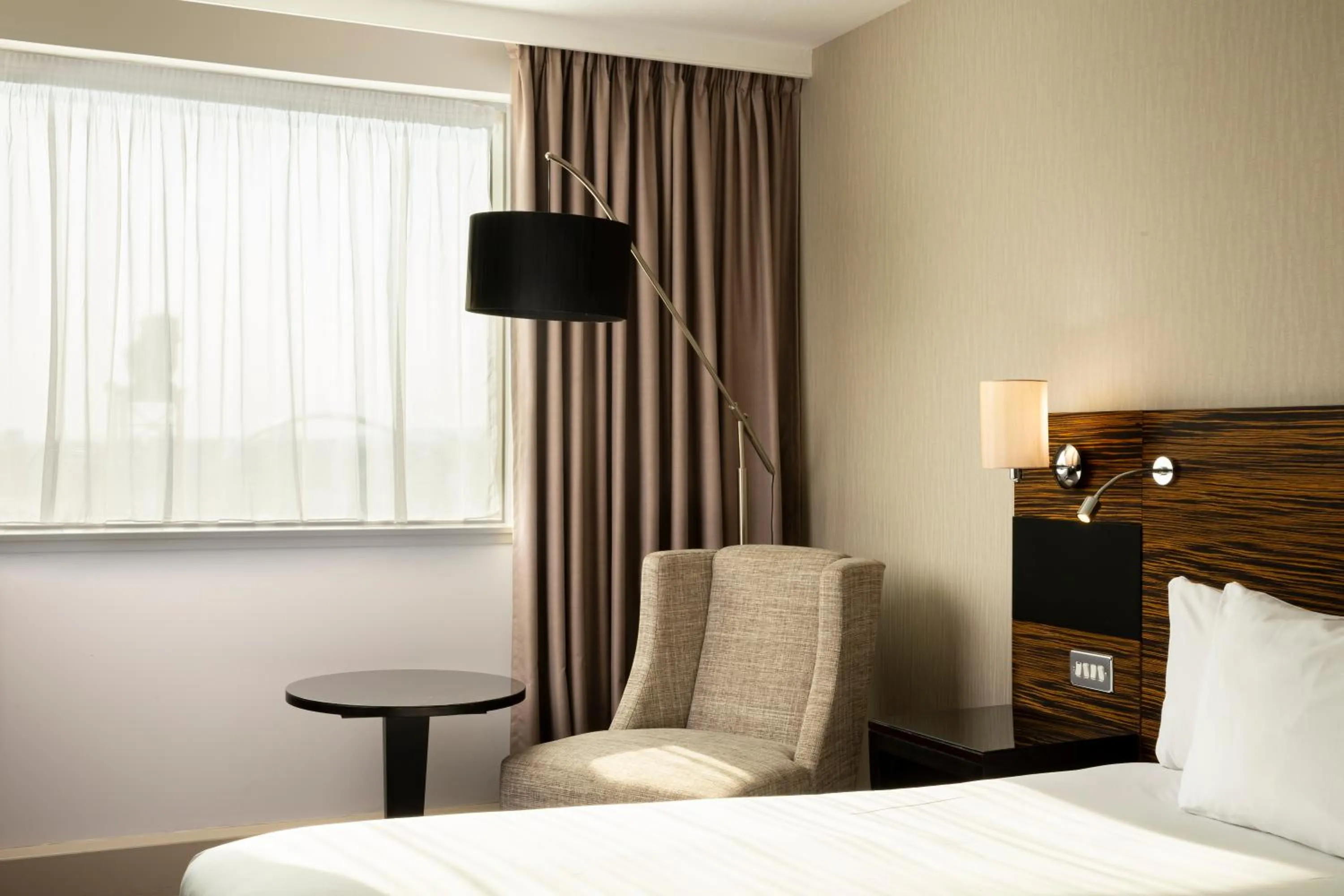 Seating area, Bed in Crowne Plaza Glasgow by IHG