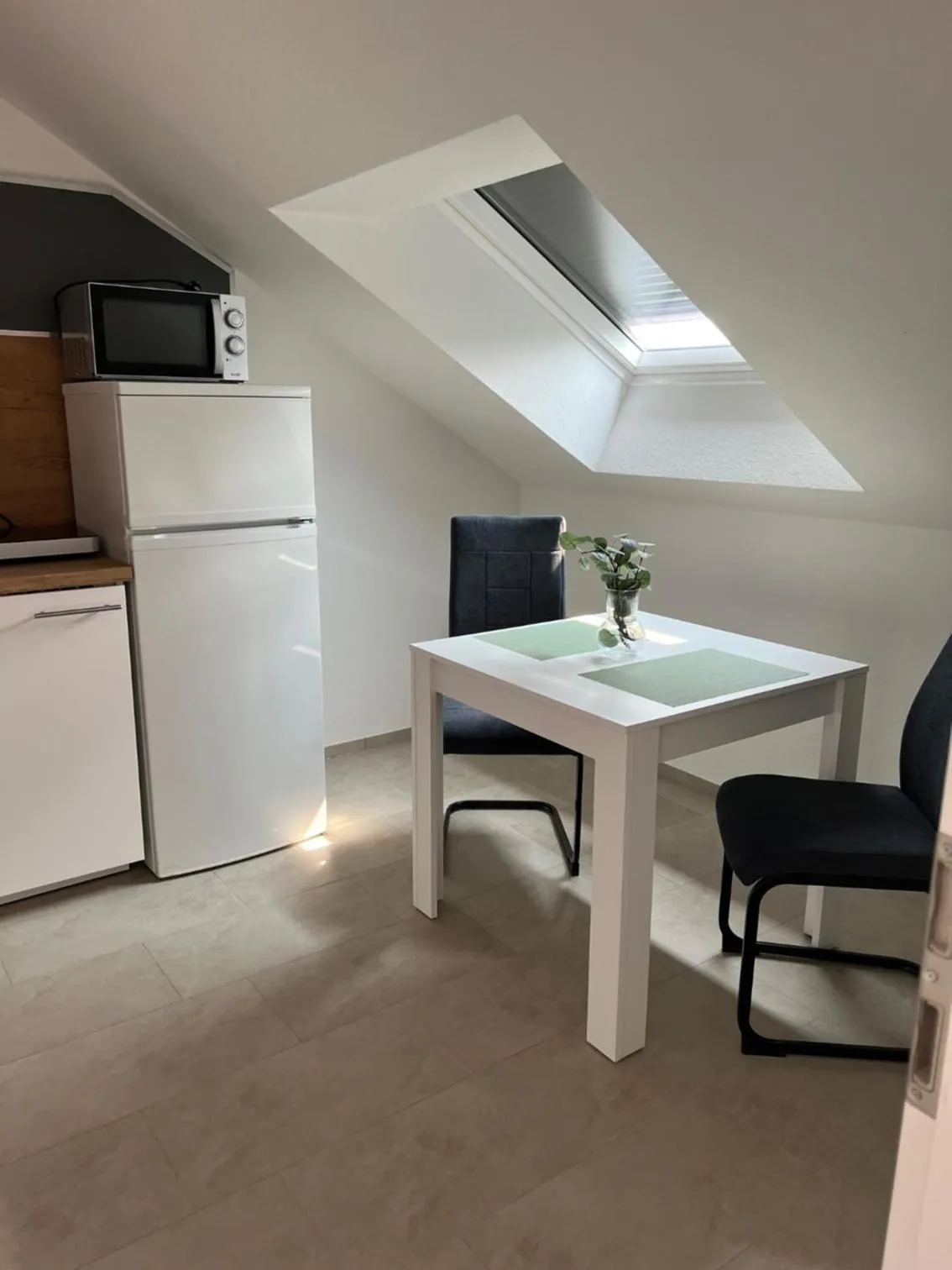 Kitchen or kitchenette in New Age Boardinghaus Bad Wimpfen