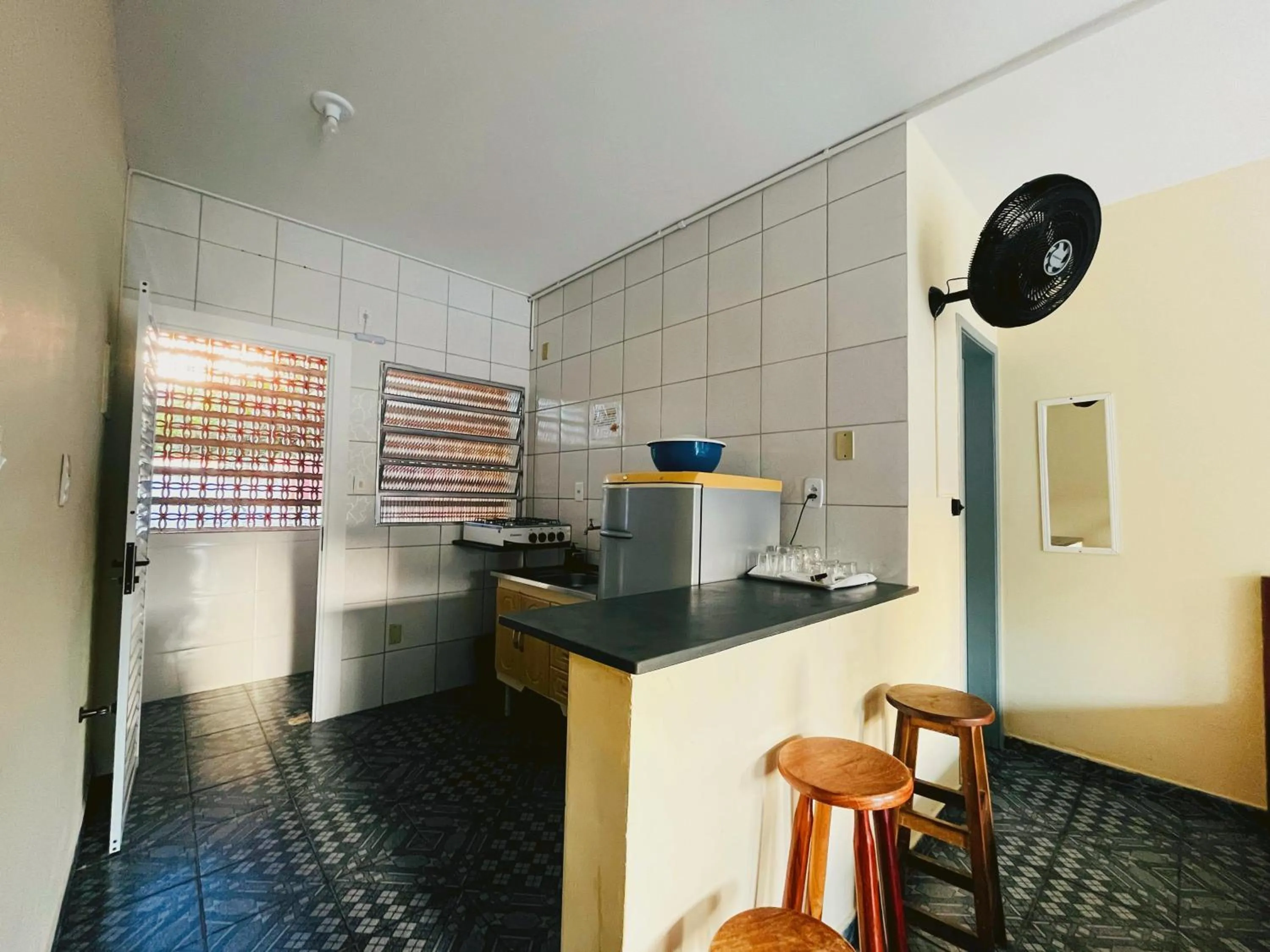 Kitchen or kitchenette in Pousada Caraguá