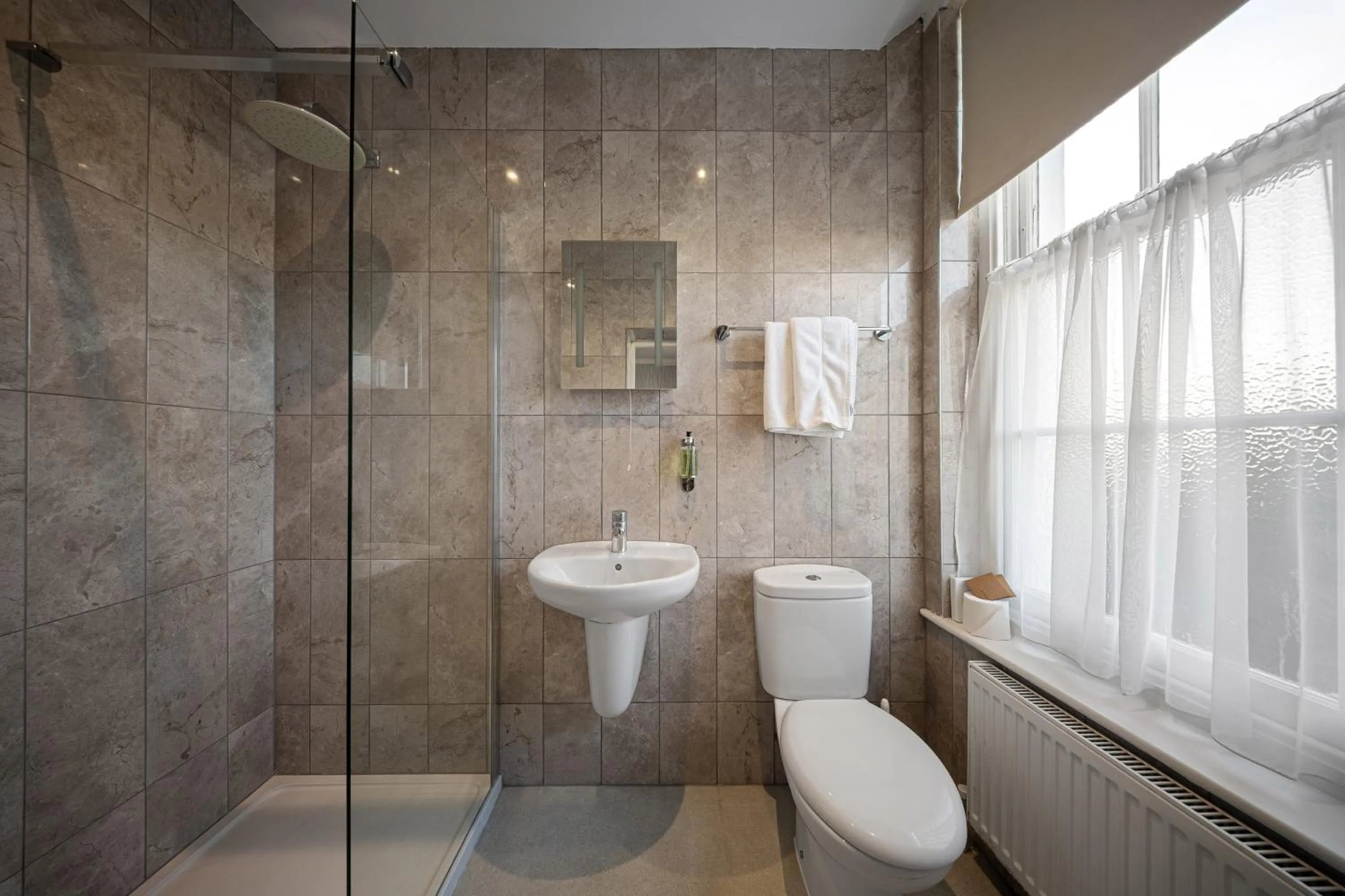 Shower in The Clarendon Hotel