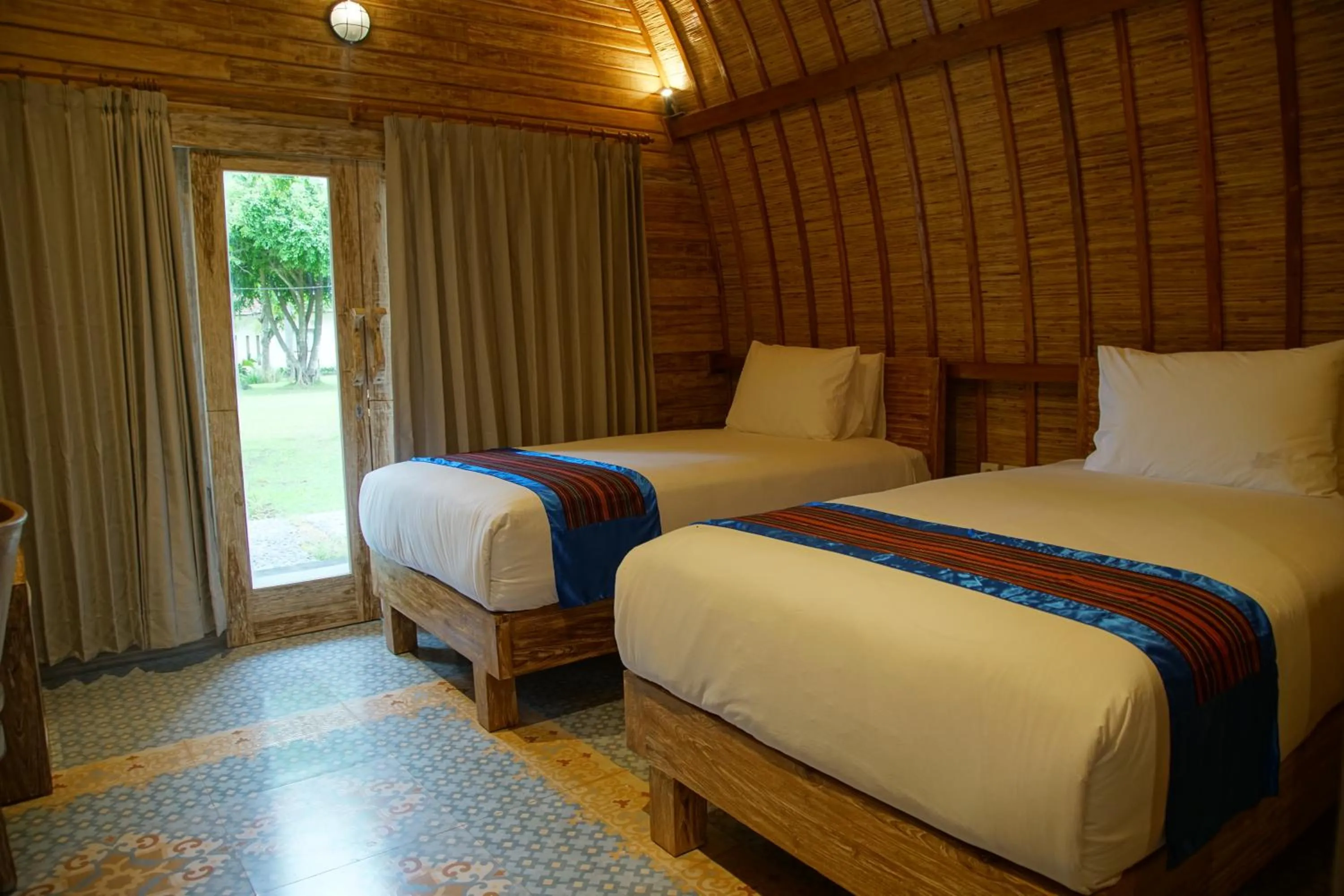 Bed in Puri Rinjani Bungalows & Hostel