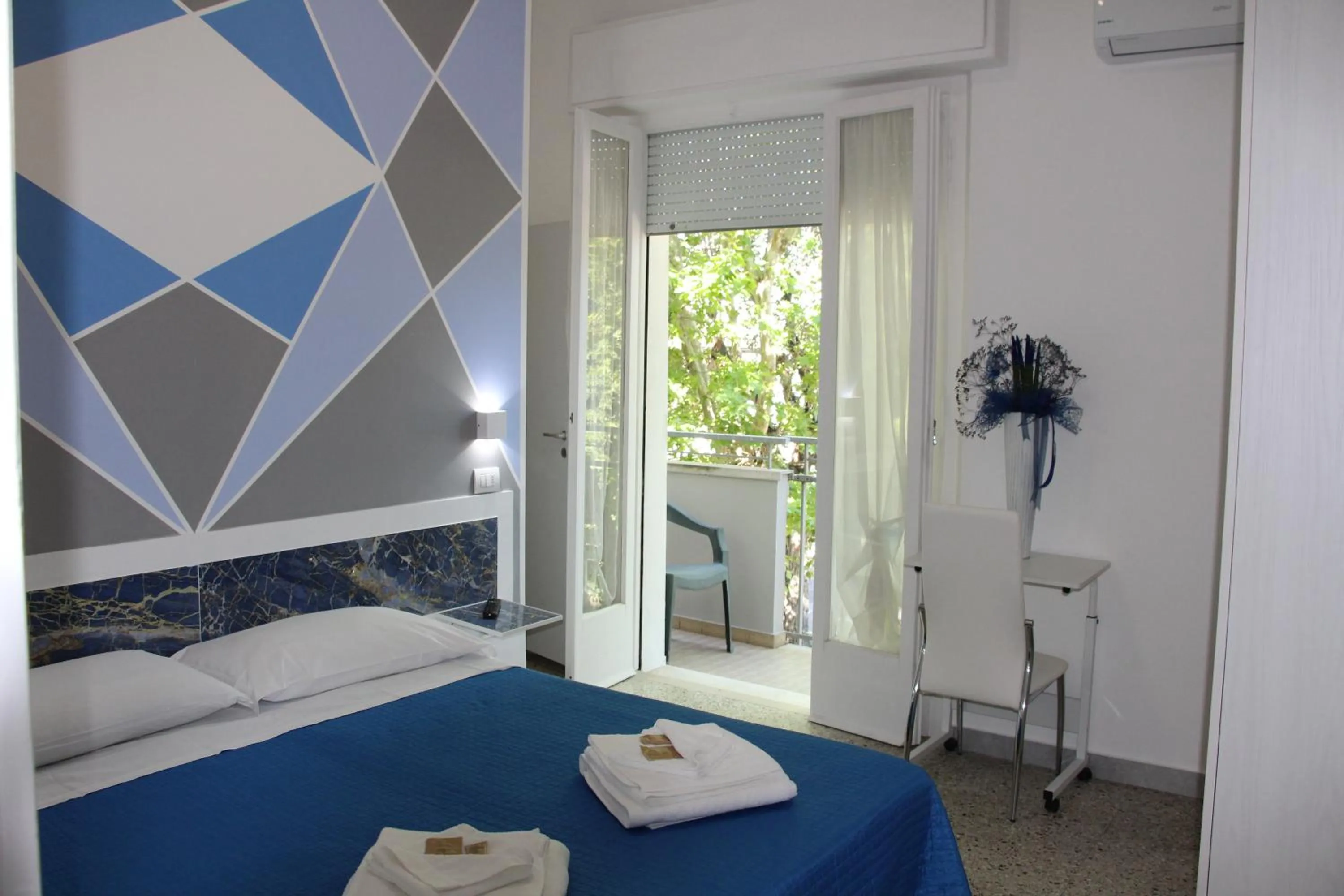 Bedroom, Bed in Martina's Hotel