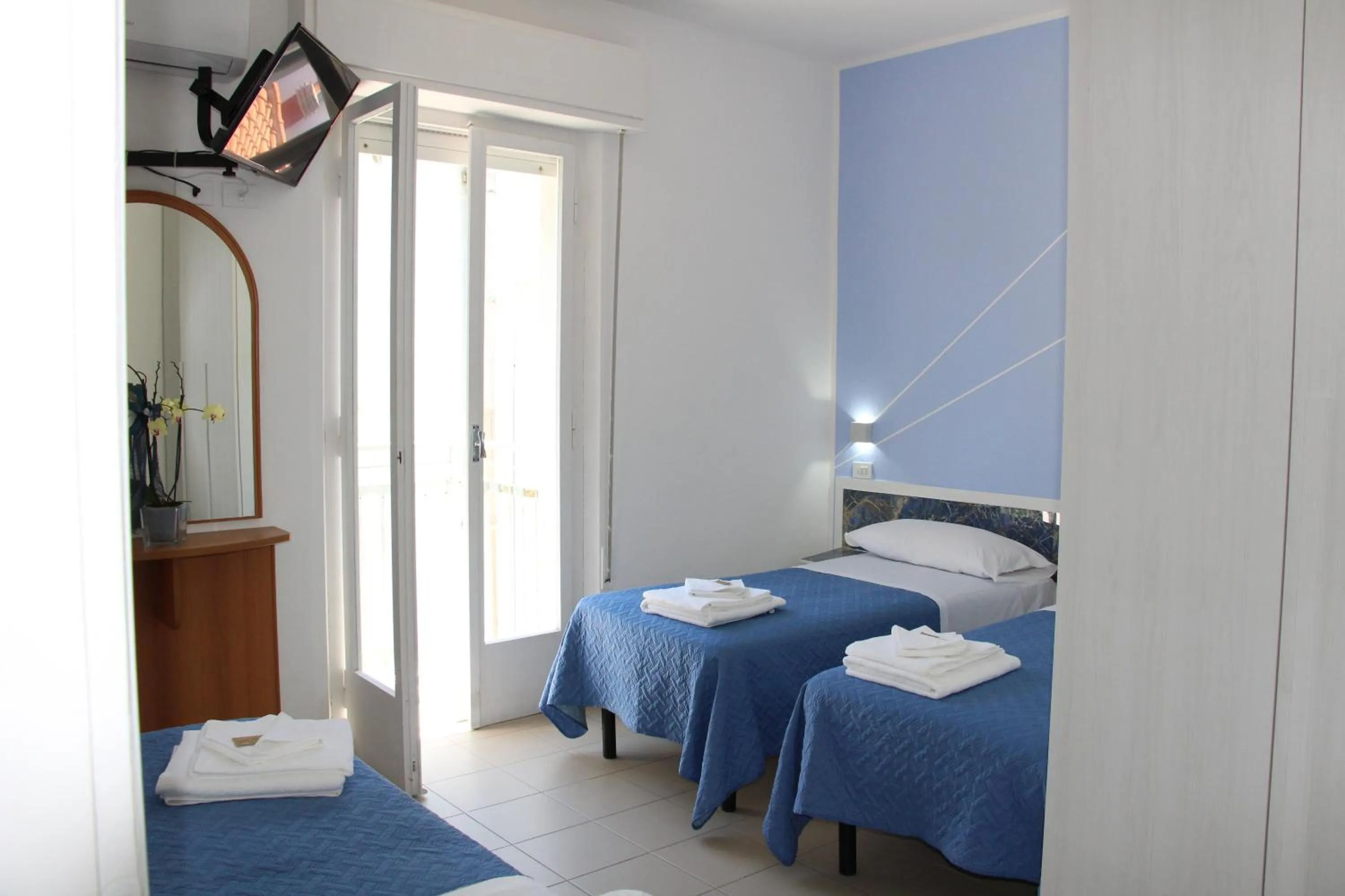 Bed in Martina's Hotel