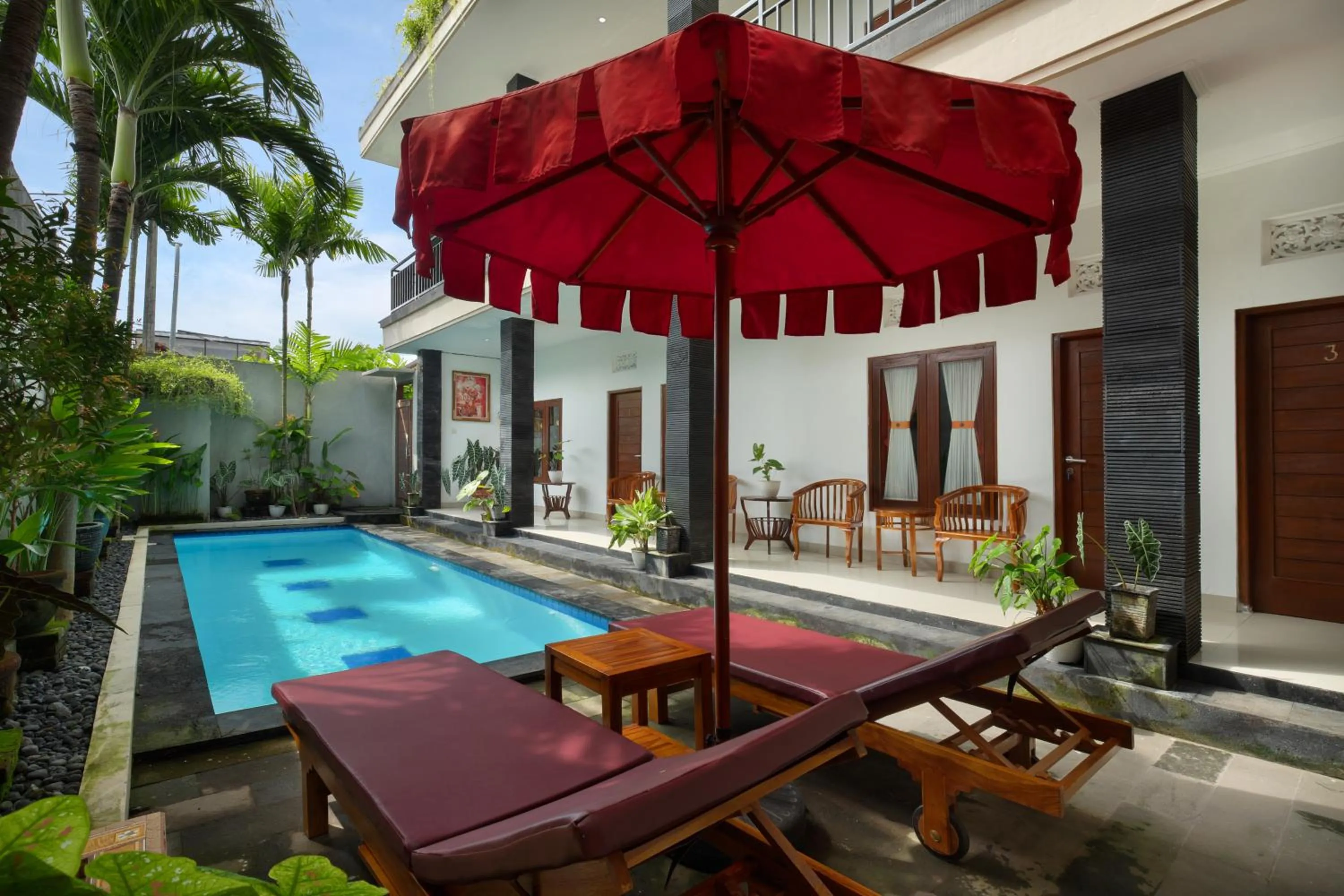Swimming pool in Graha Wedha Suite Kuta by kamara