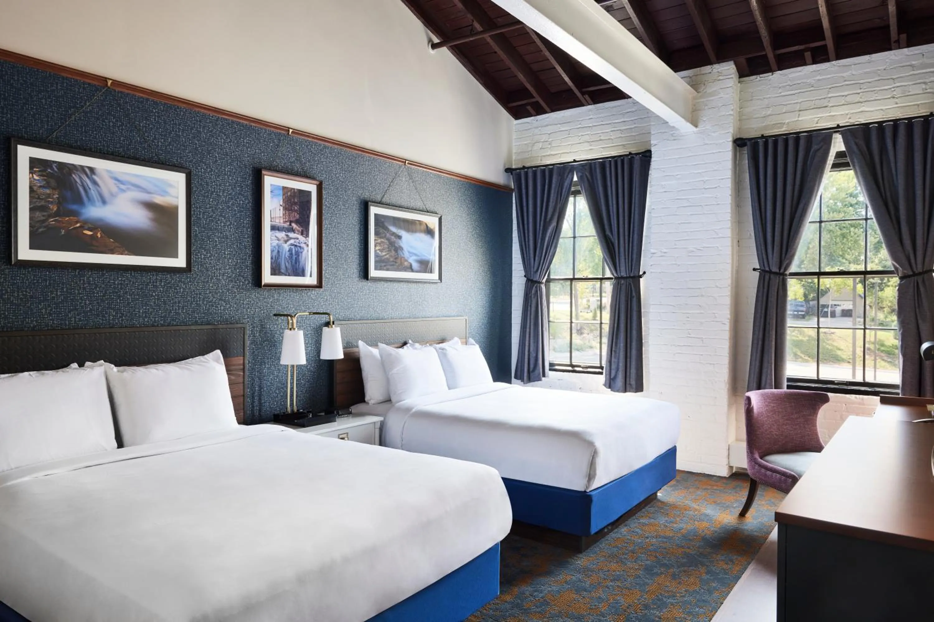 Bed in The Confluence Hotel