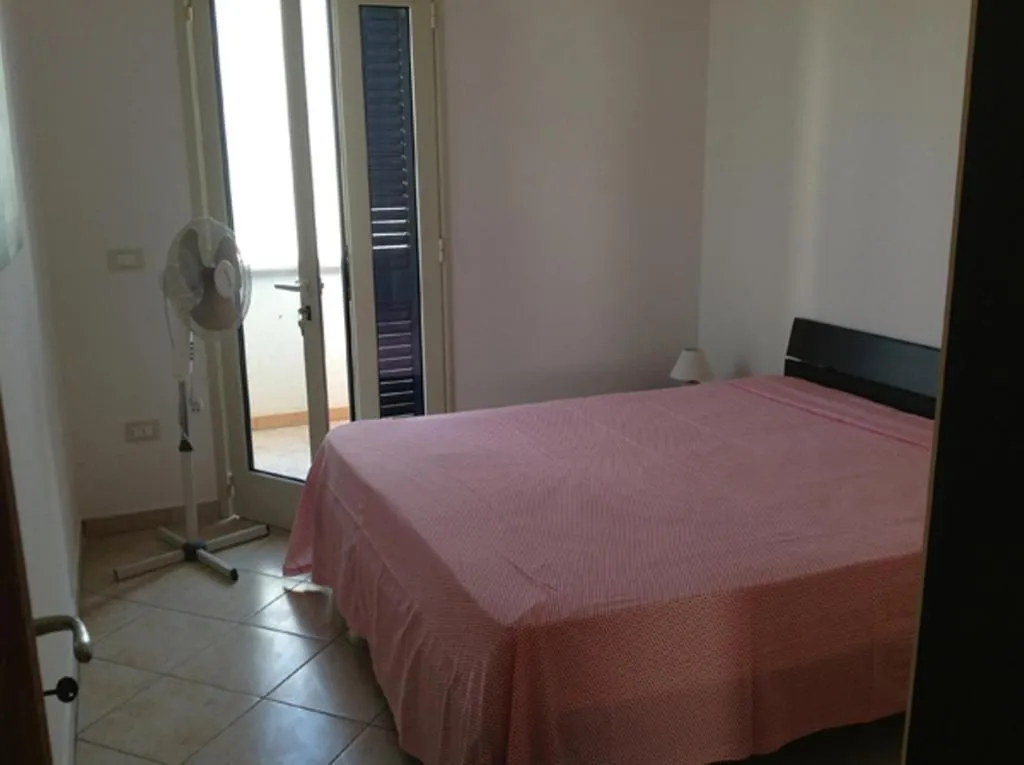 Photo of the whole room, Bed in Residence Giglio