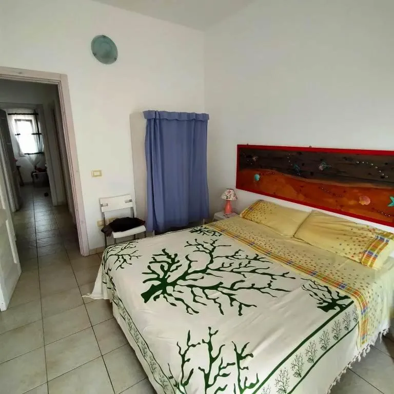 Photo of the whole room, Bed in Residence Giglio