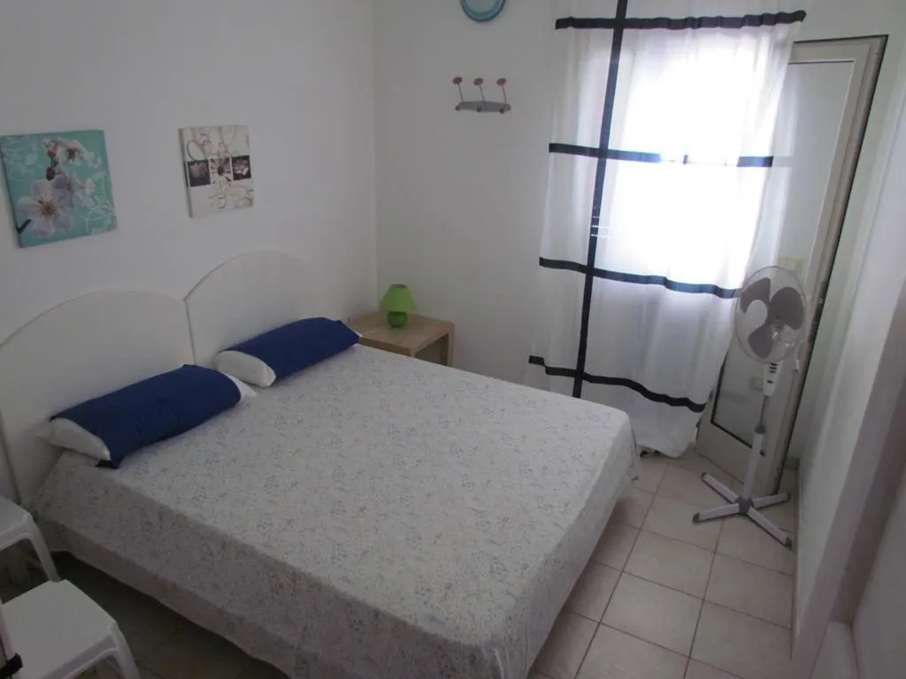 Photo of the whole room, Bed in Residence Giglio