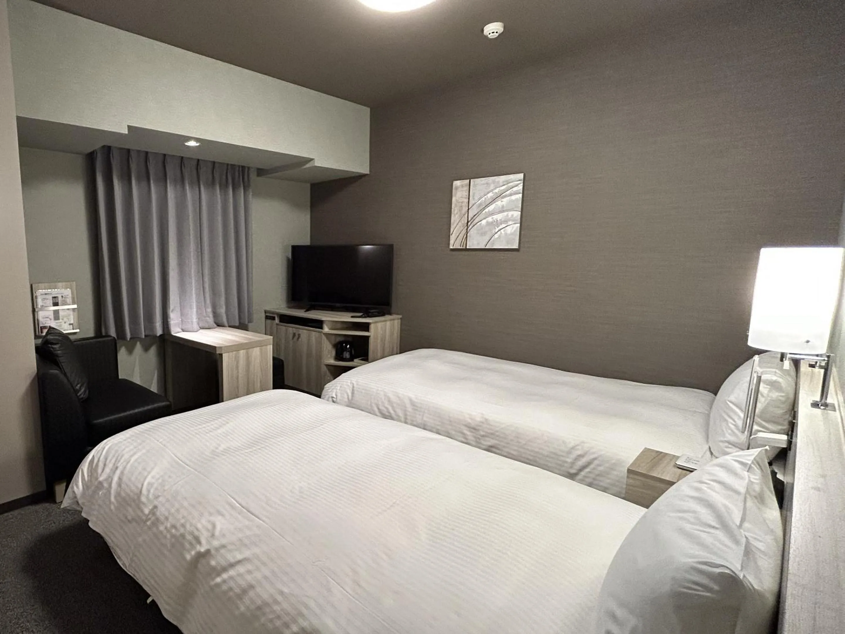 Photo of the whole room, Bed in Hotel Route Inn Owariseto Ekimae