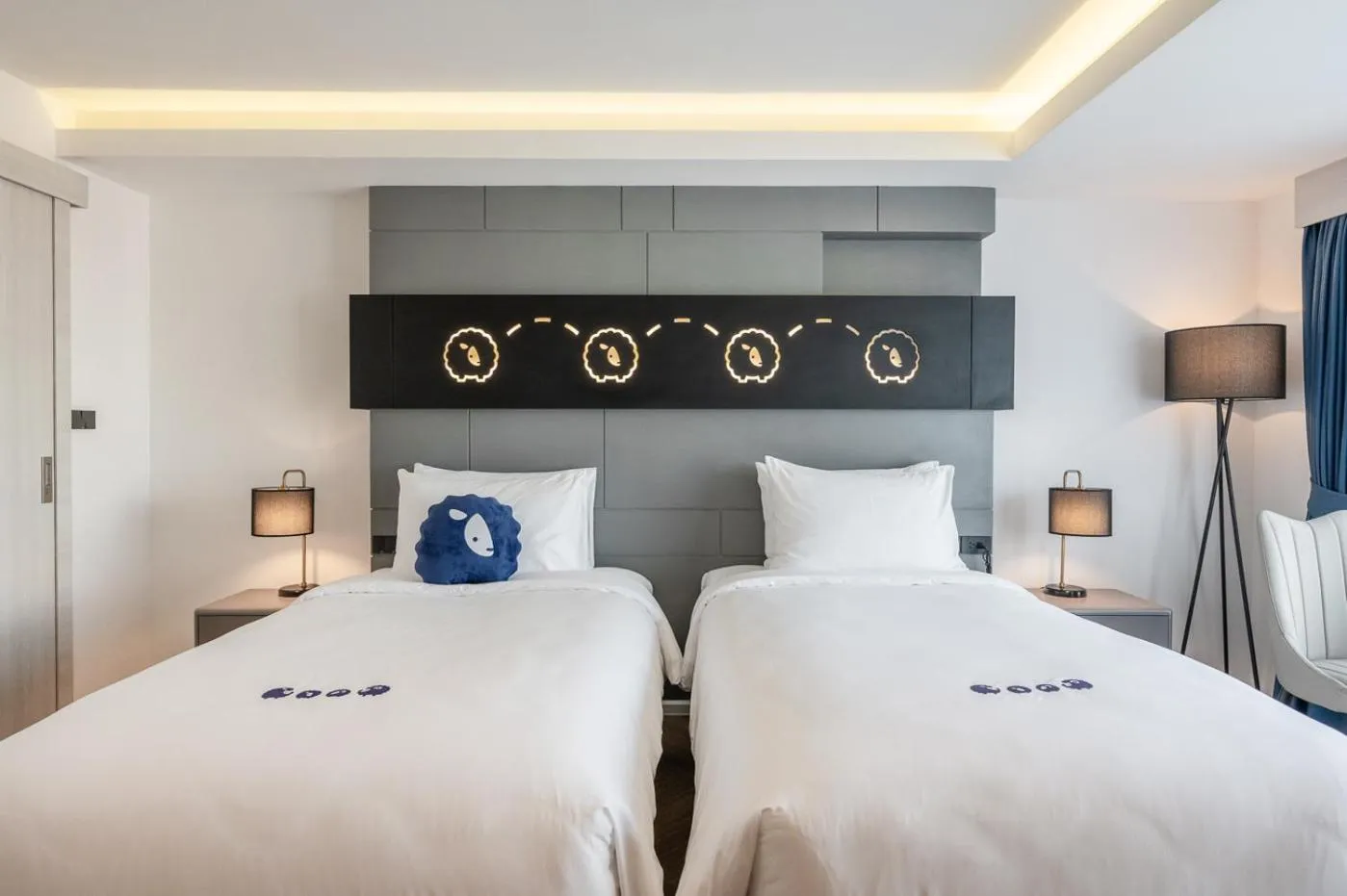 Bed in Kokotel Chiang Rai Airport Suites