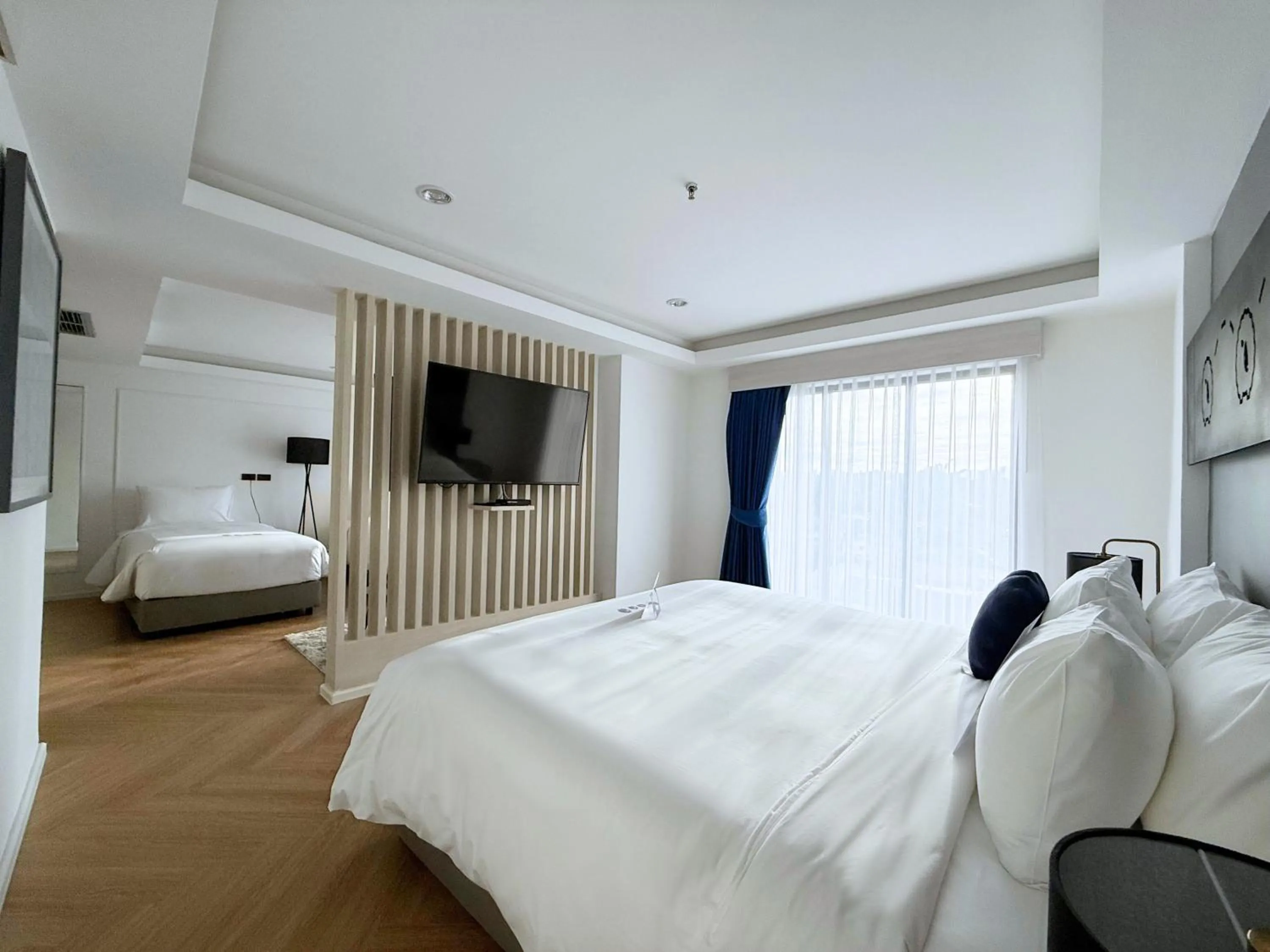 Bed in Kokotel Chiang Rai Airport Suites
