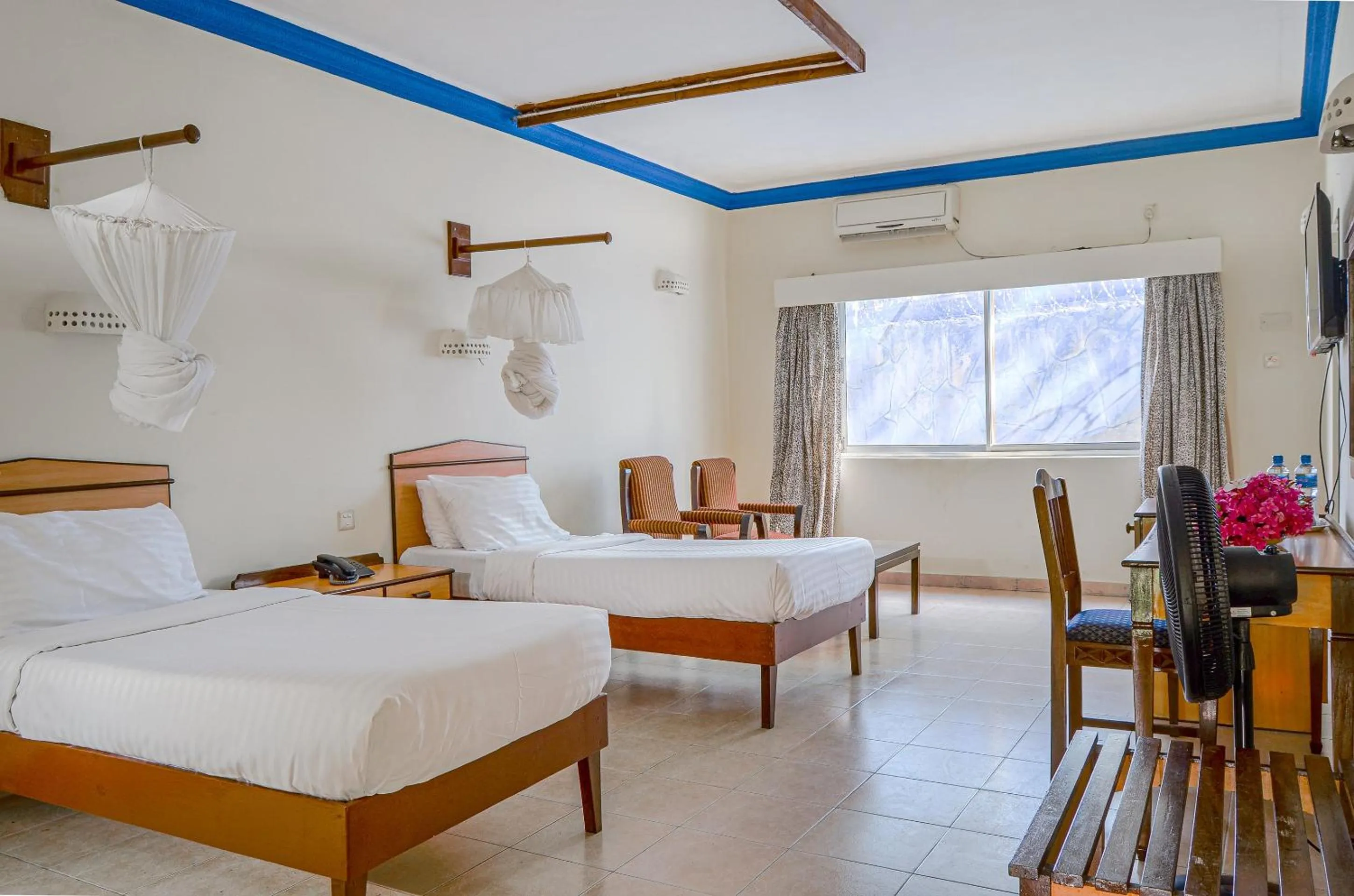 Photo of the whole room, Bed in Sai Rock Beach Hotel & Spa