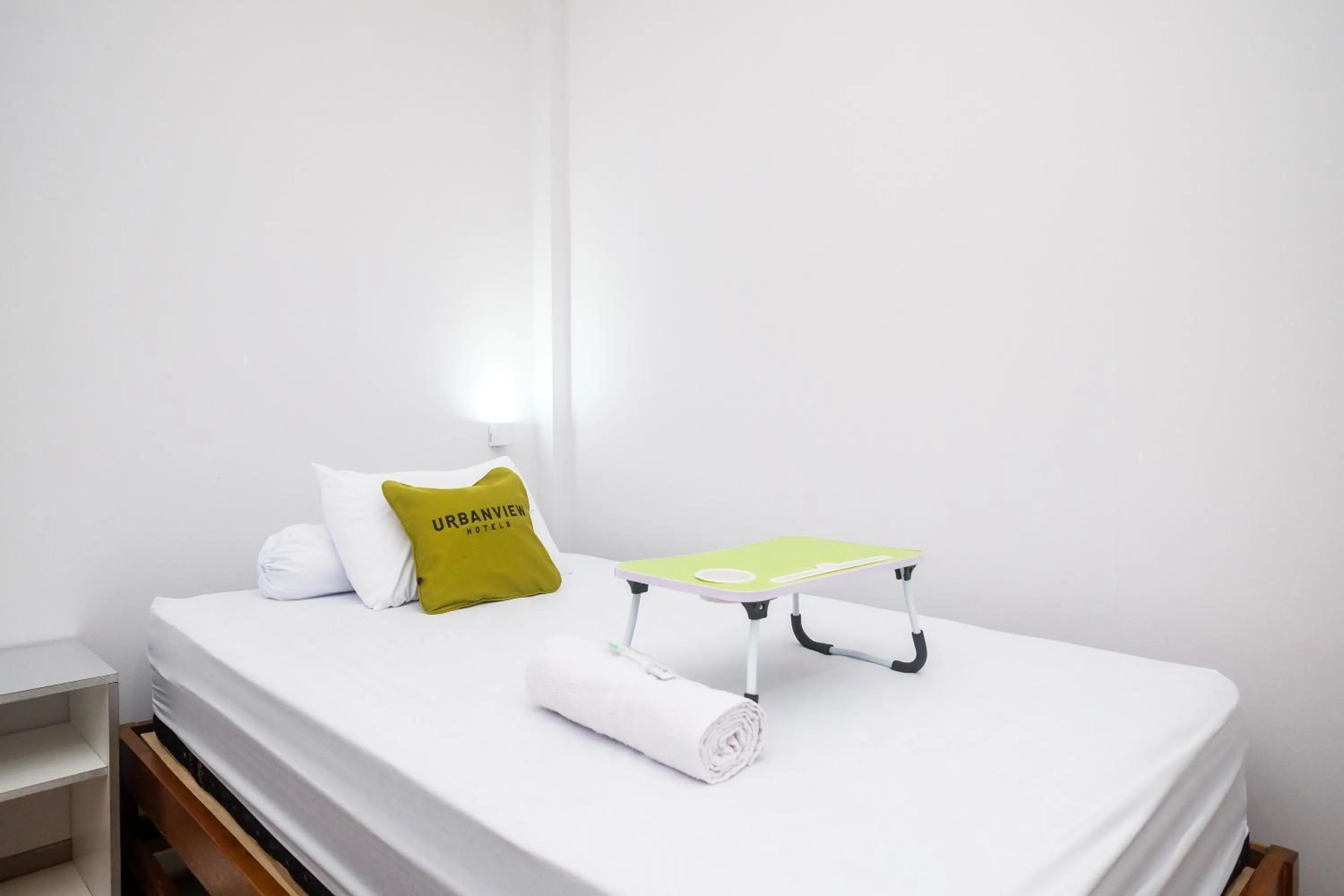 Bed in Urbanview Syariah Loji Arum Stasiun Klaten by RedDoorz