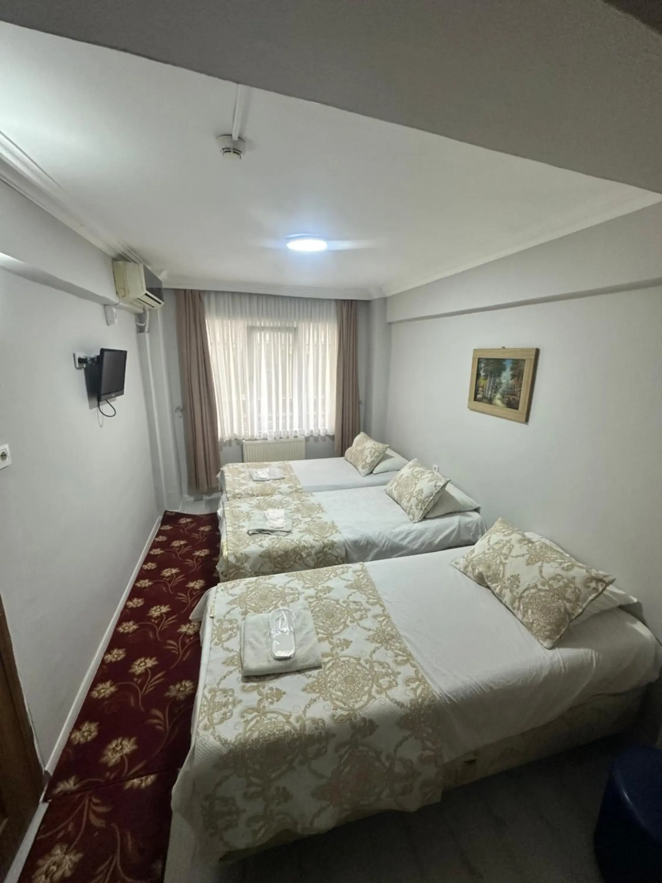 Standard Triple Room in Amore Hotel Istanbul Standard Triple Room in Amore Hotel Istanbul