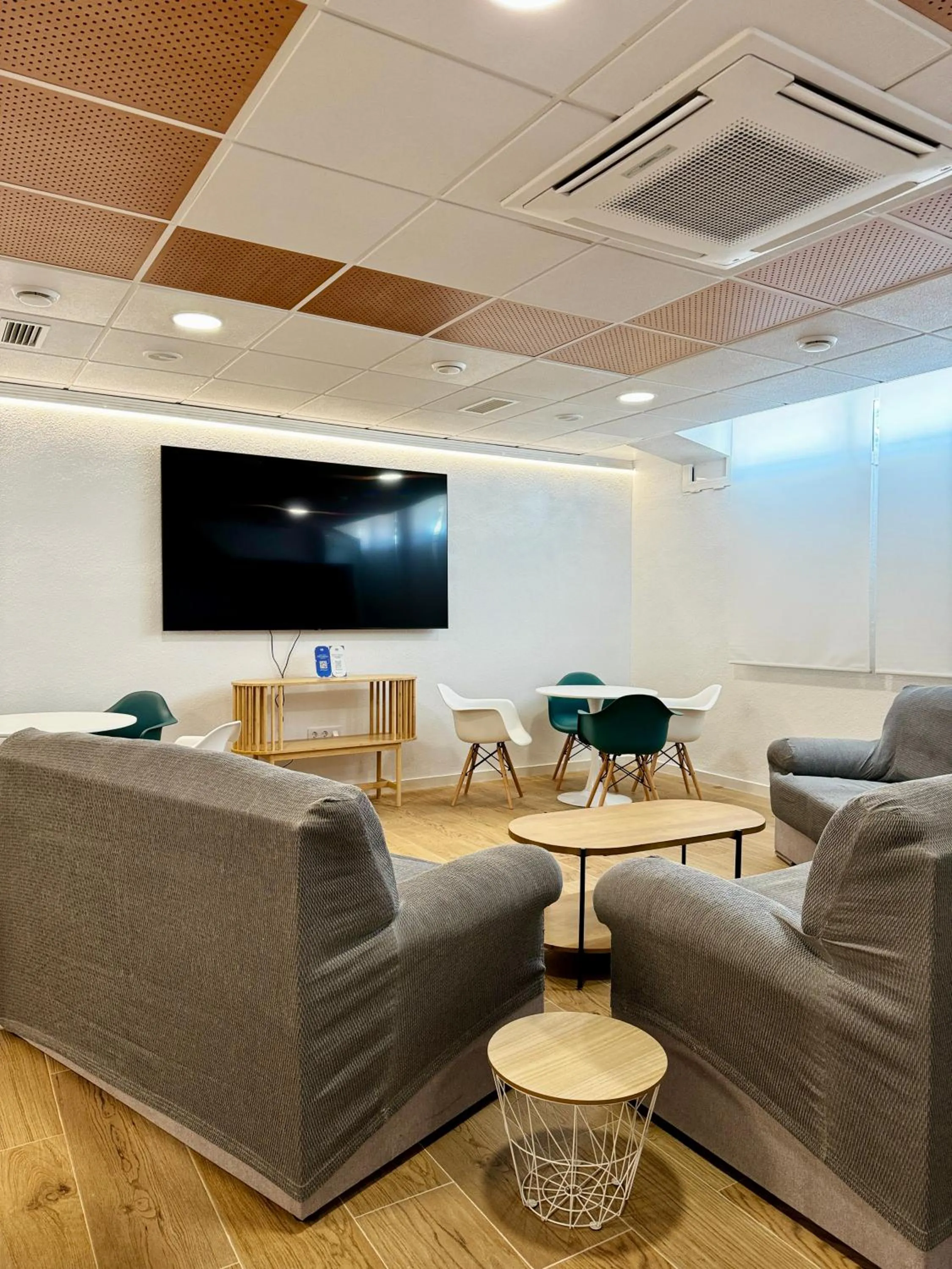 Communal lounge/ TV room in Residencia Mediterraneo