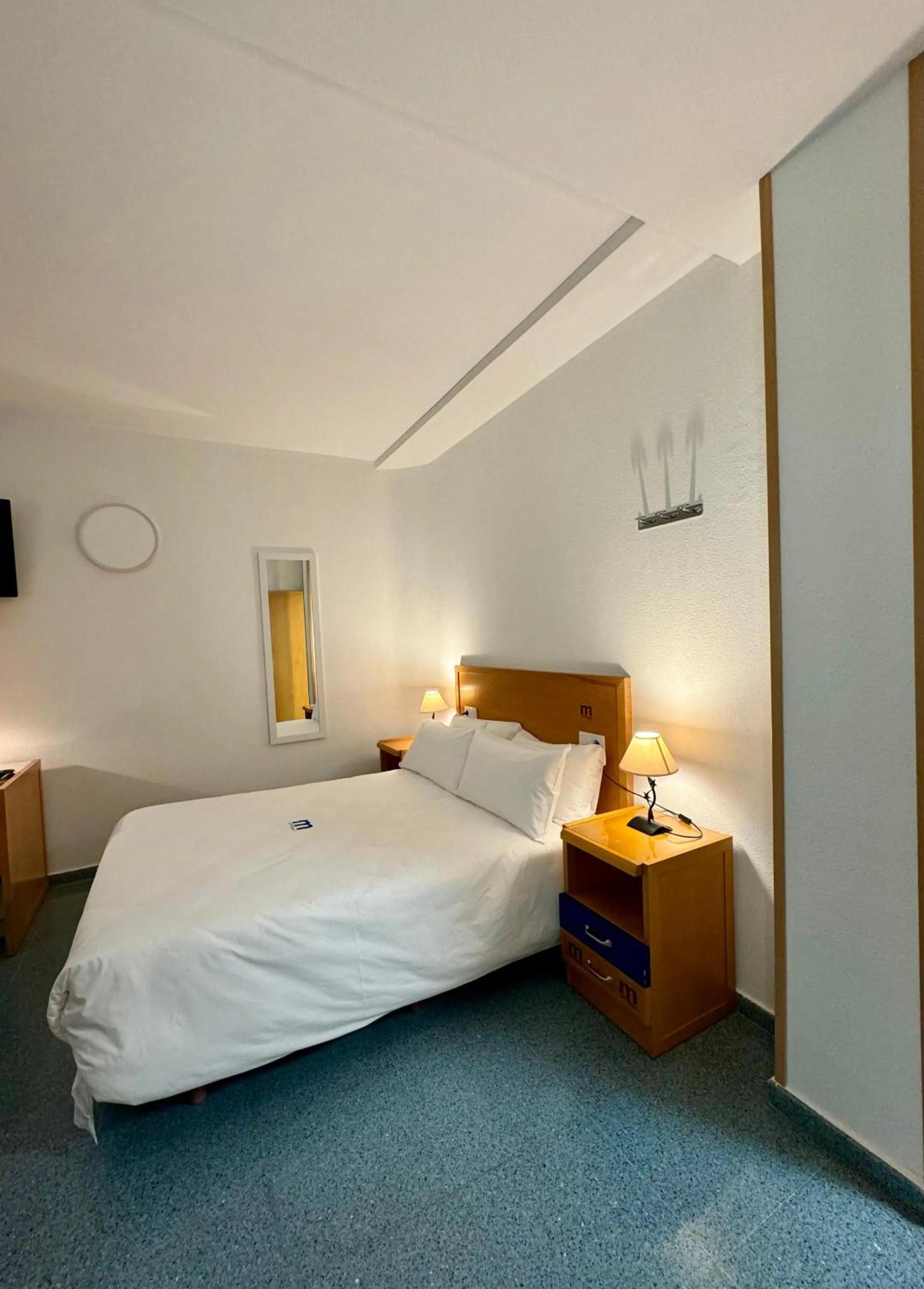 Bedroom, Bed in Residencia Mediterraneo