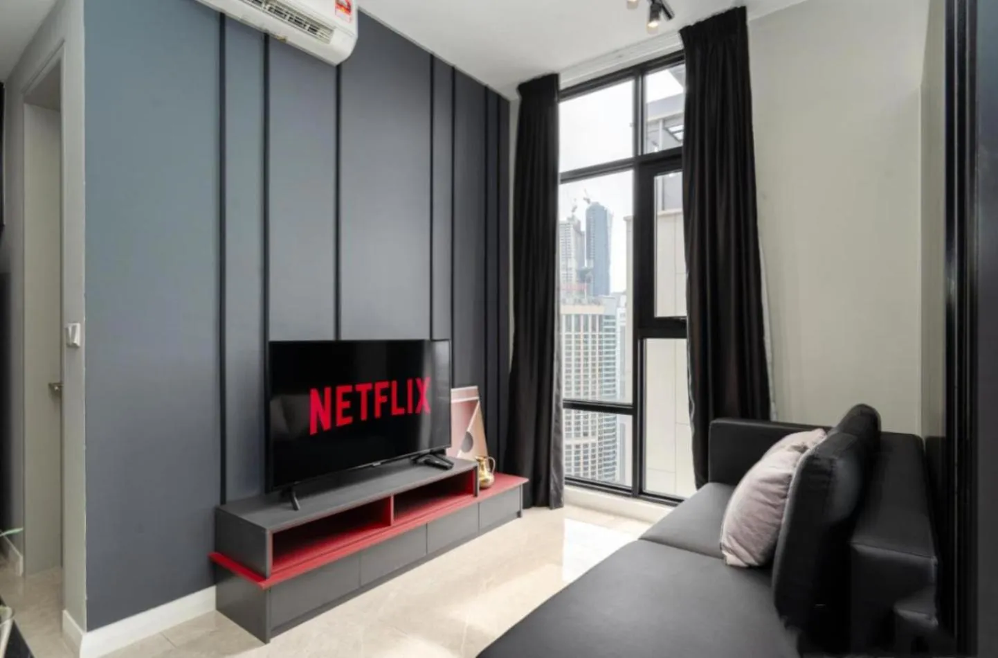 Communal lounge/ TV room in Axon Residence Bukit Bintang by Luna