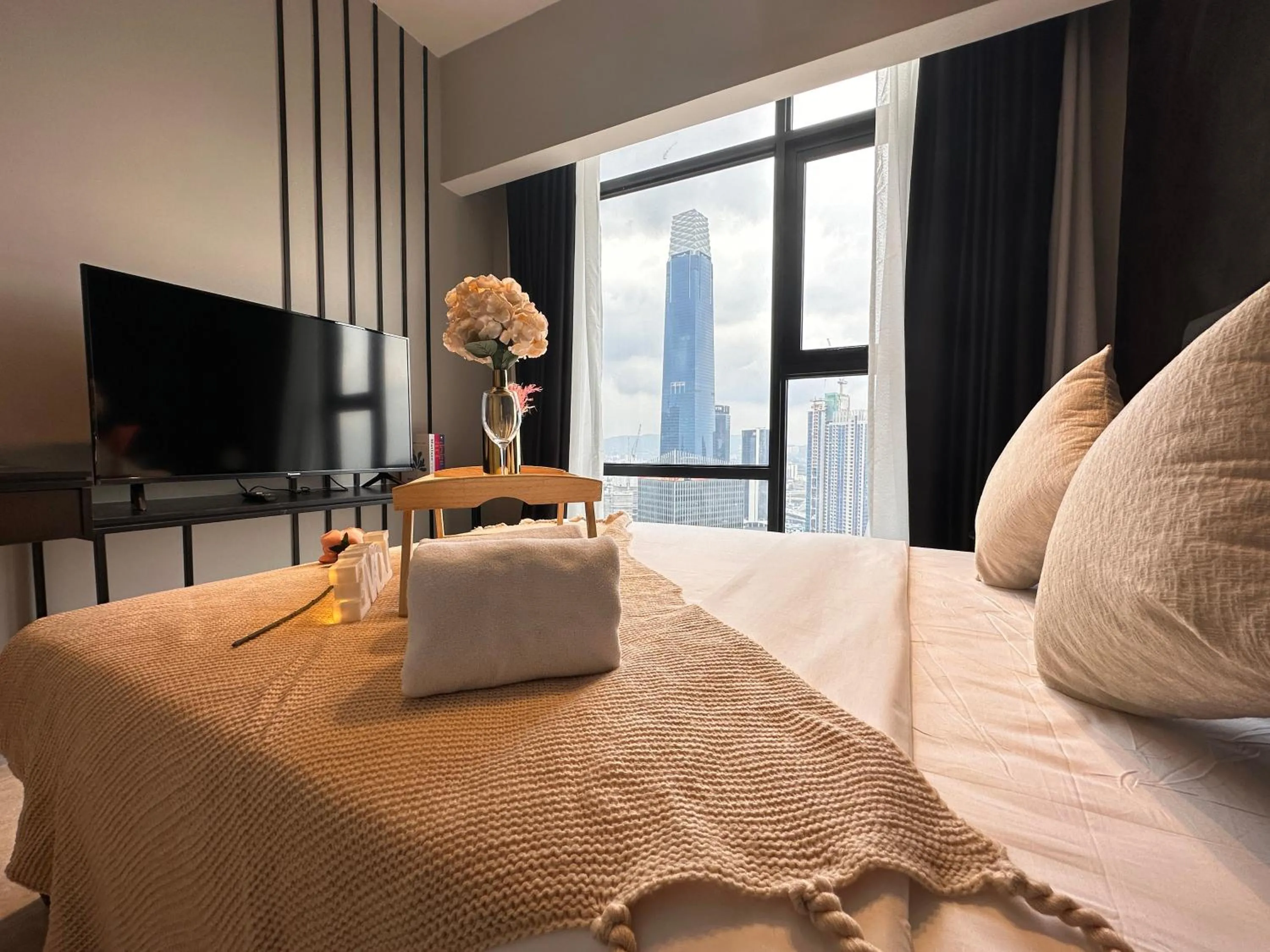 Communal lounge/ TV room, Bed in Axon Residence Bukit Bintang by Luna