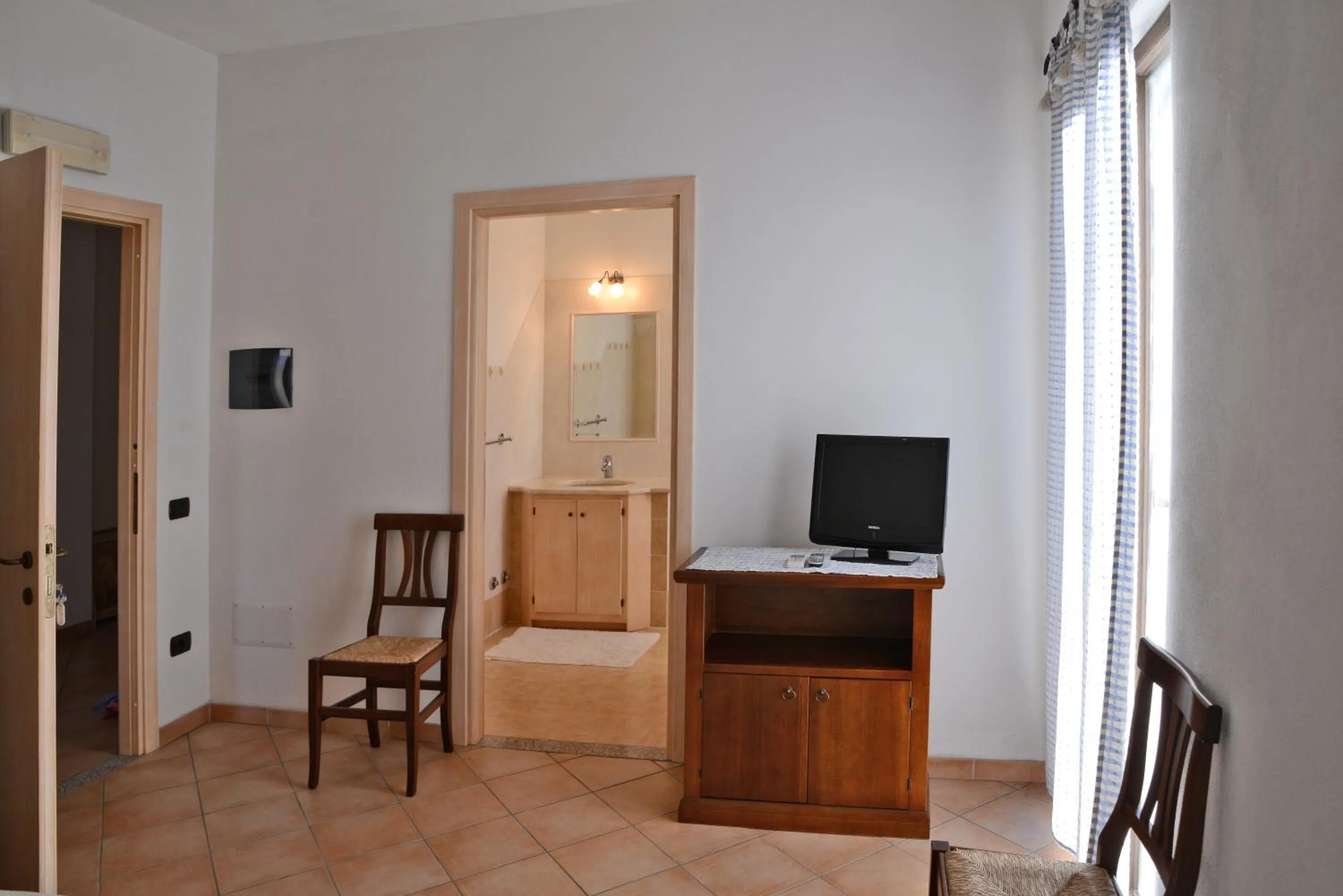 Photo of the whole room in Gallura Affittacamere