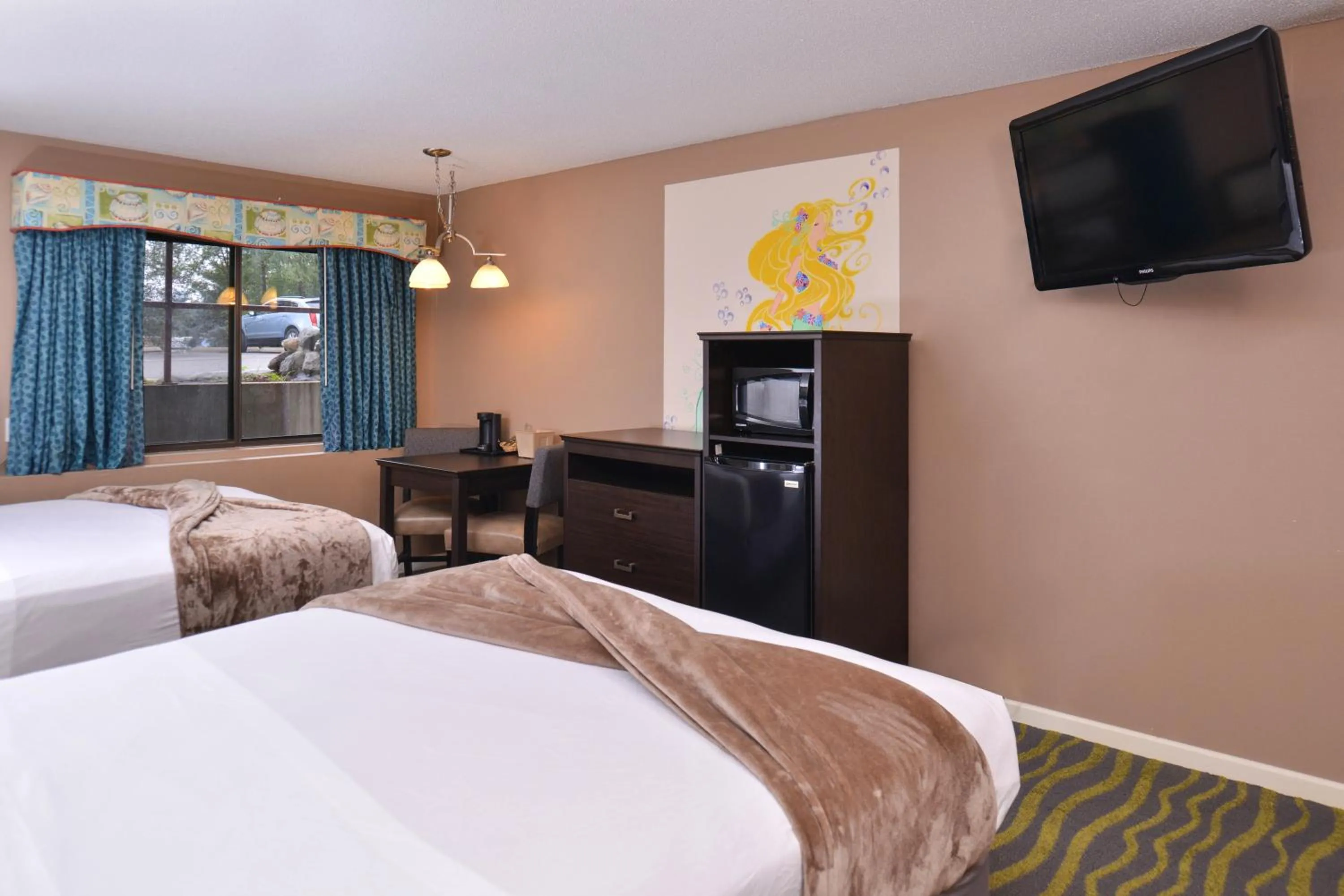 TV and multimedia in Atlantis Family Waterpark Hotel, an Ascend Collection Hotel