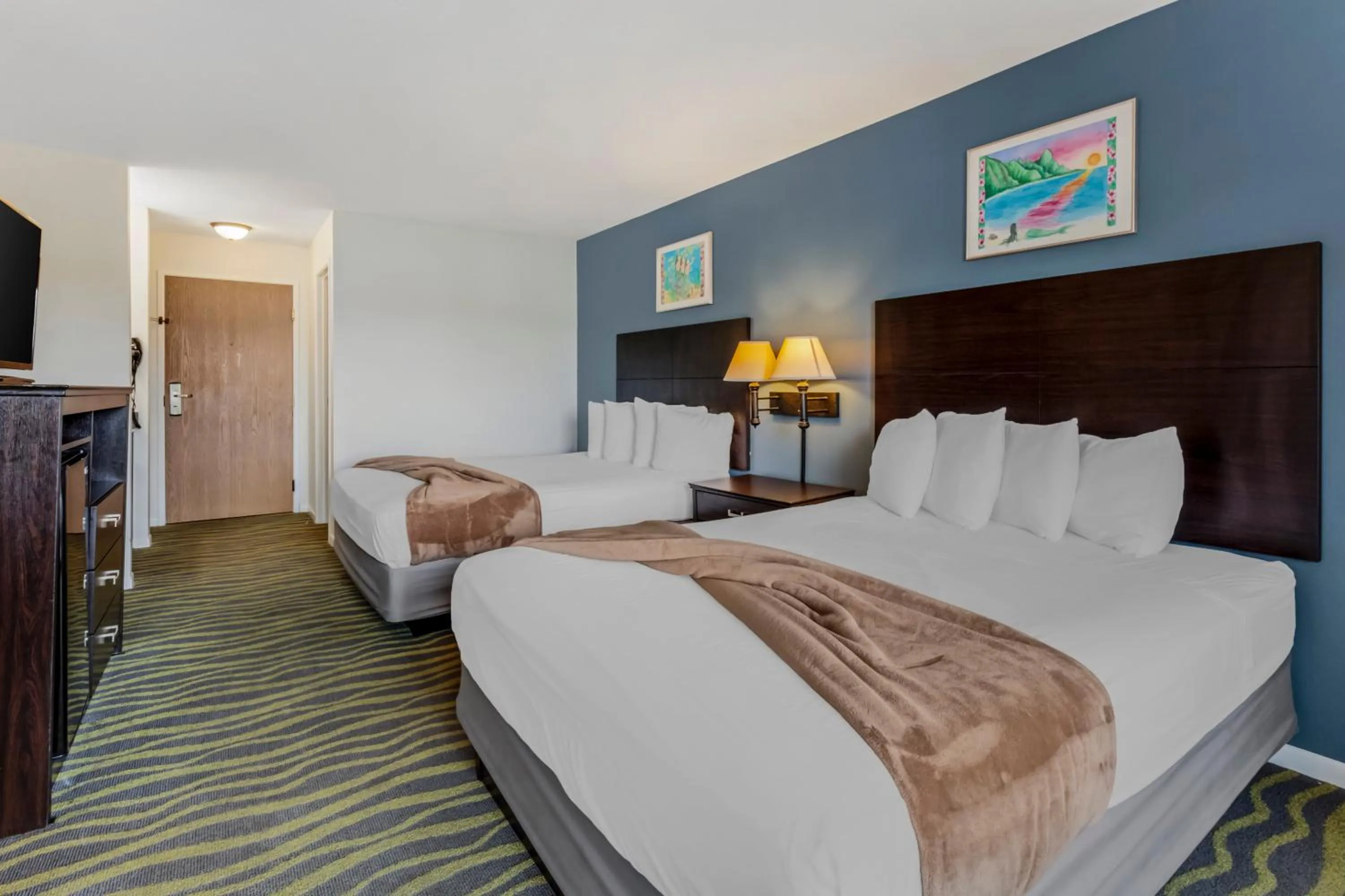 Bed in Atlantis Family Waterpark Hotel, an Ascend Collection Hotel