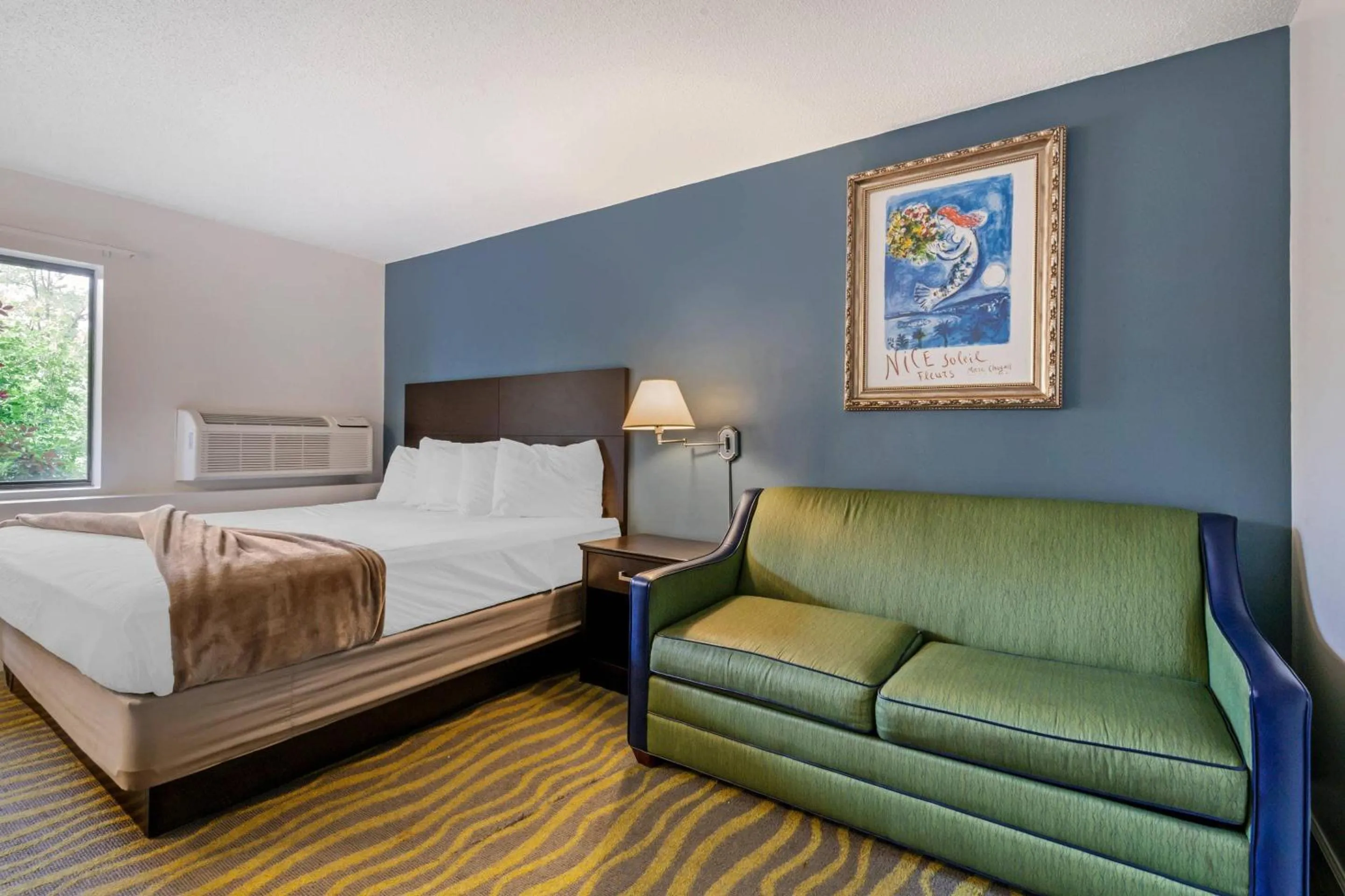 Bedroom in Atlantis Family Waterpark Hotel, an Ascend Collection Hotel