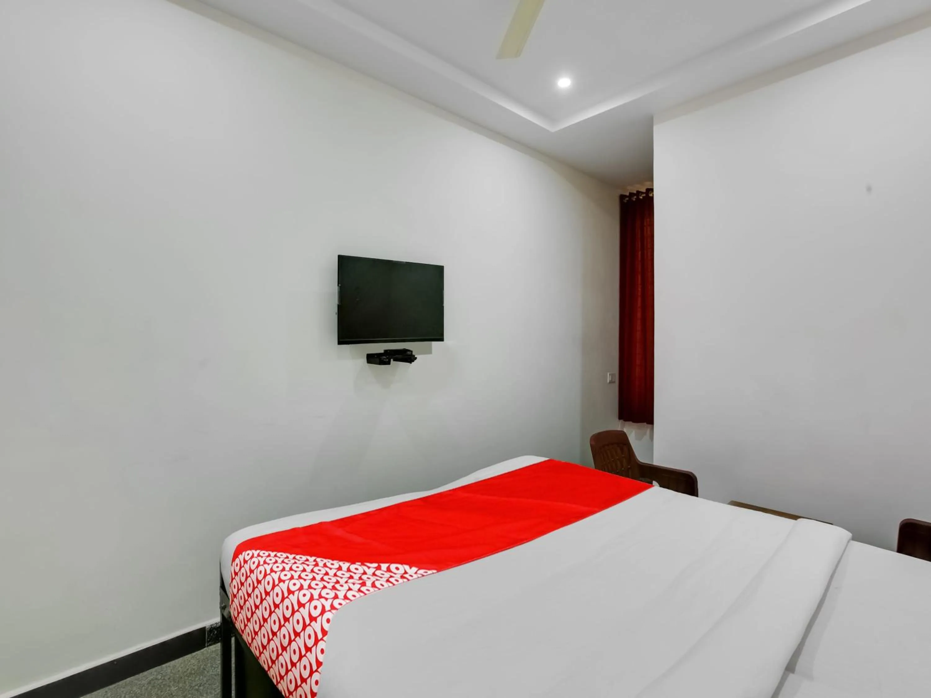 Bedroom in Hotel O Manjushree Boarding & Lodging nearby Dr.BR Ambedkar Stadium Basveshwar nagar