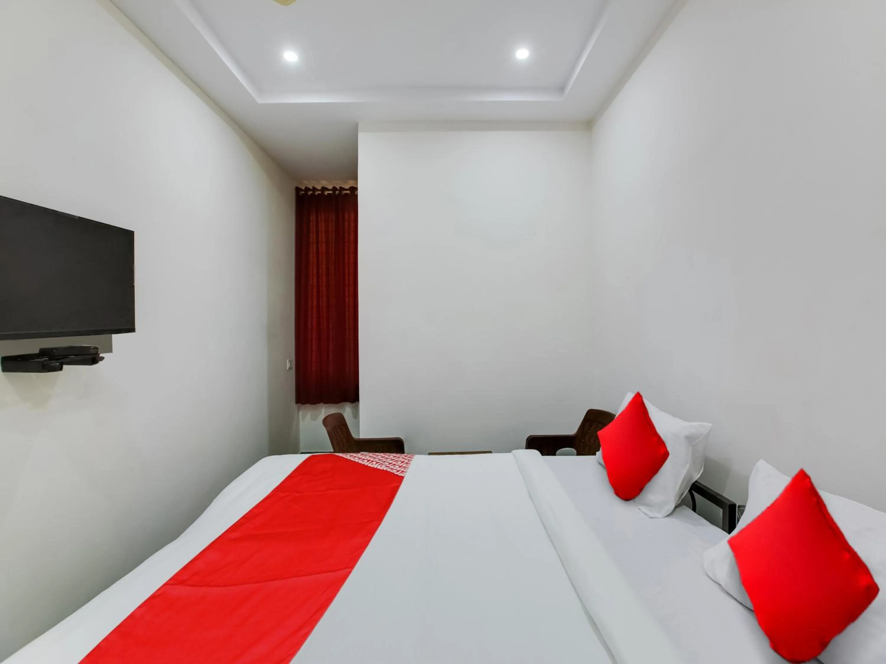 Bedroom in Hotel O Manjushree Boarding & Lodging nearby Dr.BR Ambedkar Stadium Basveshwar nagar