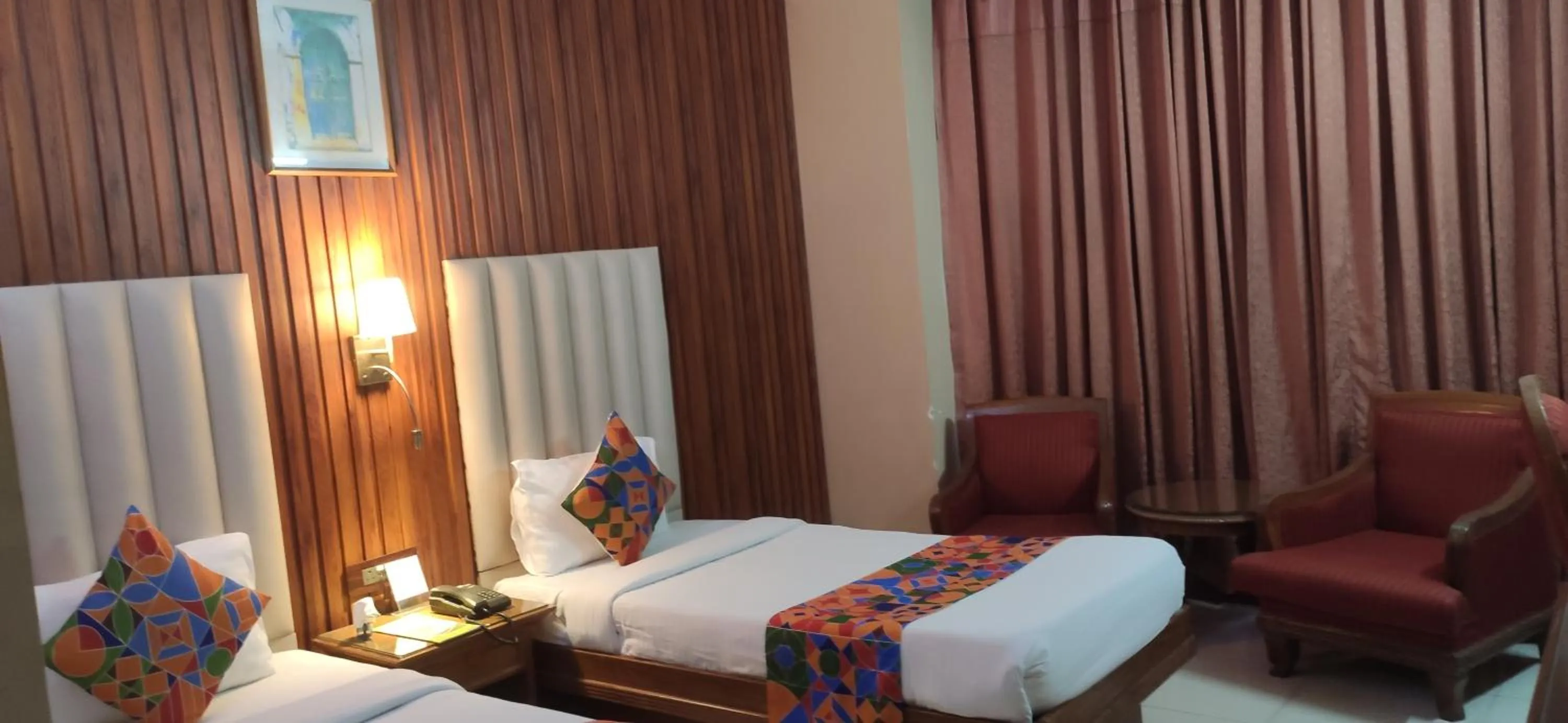 Bed in HOTEL CONCLAVE EXECUTIVE