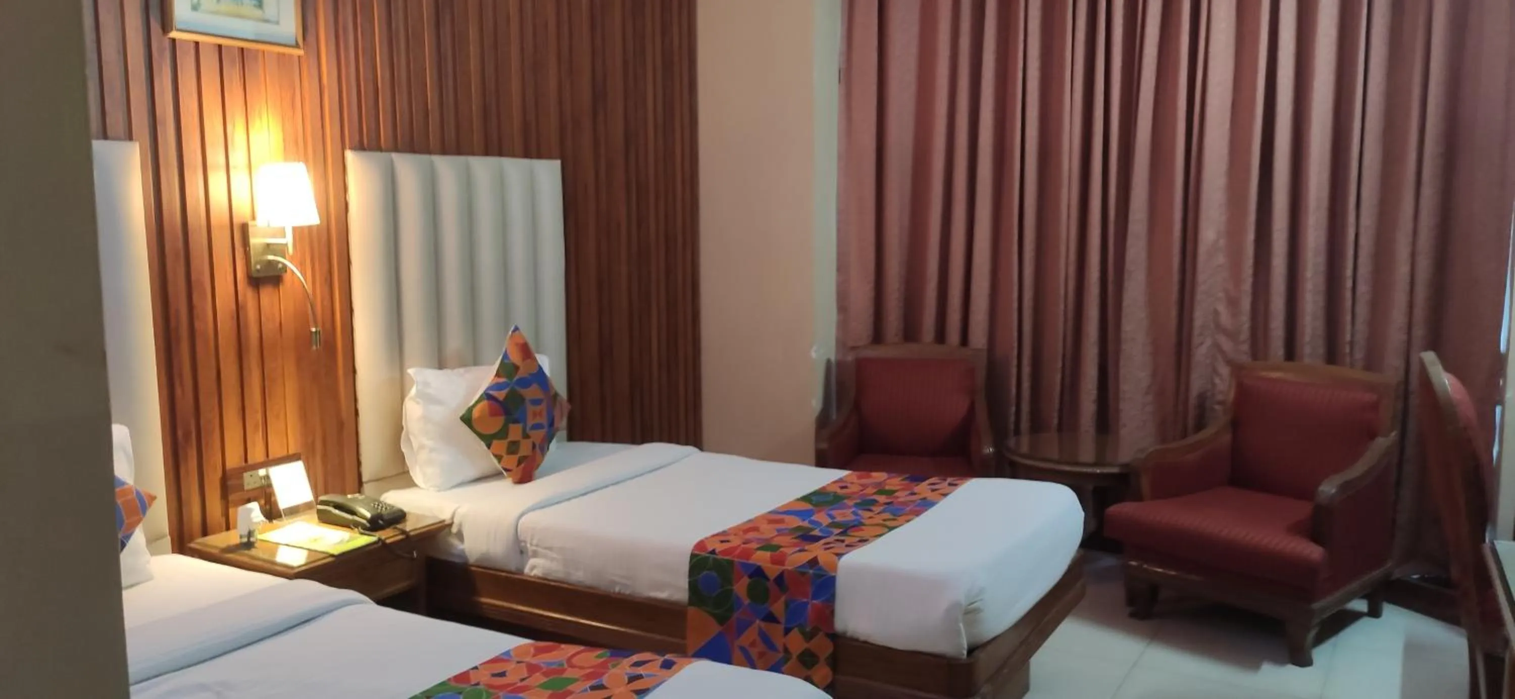 Bed in HOTEL CONCLAVE EXECUTIVE