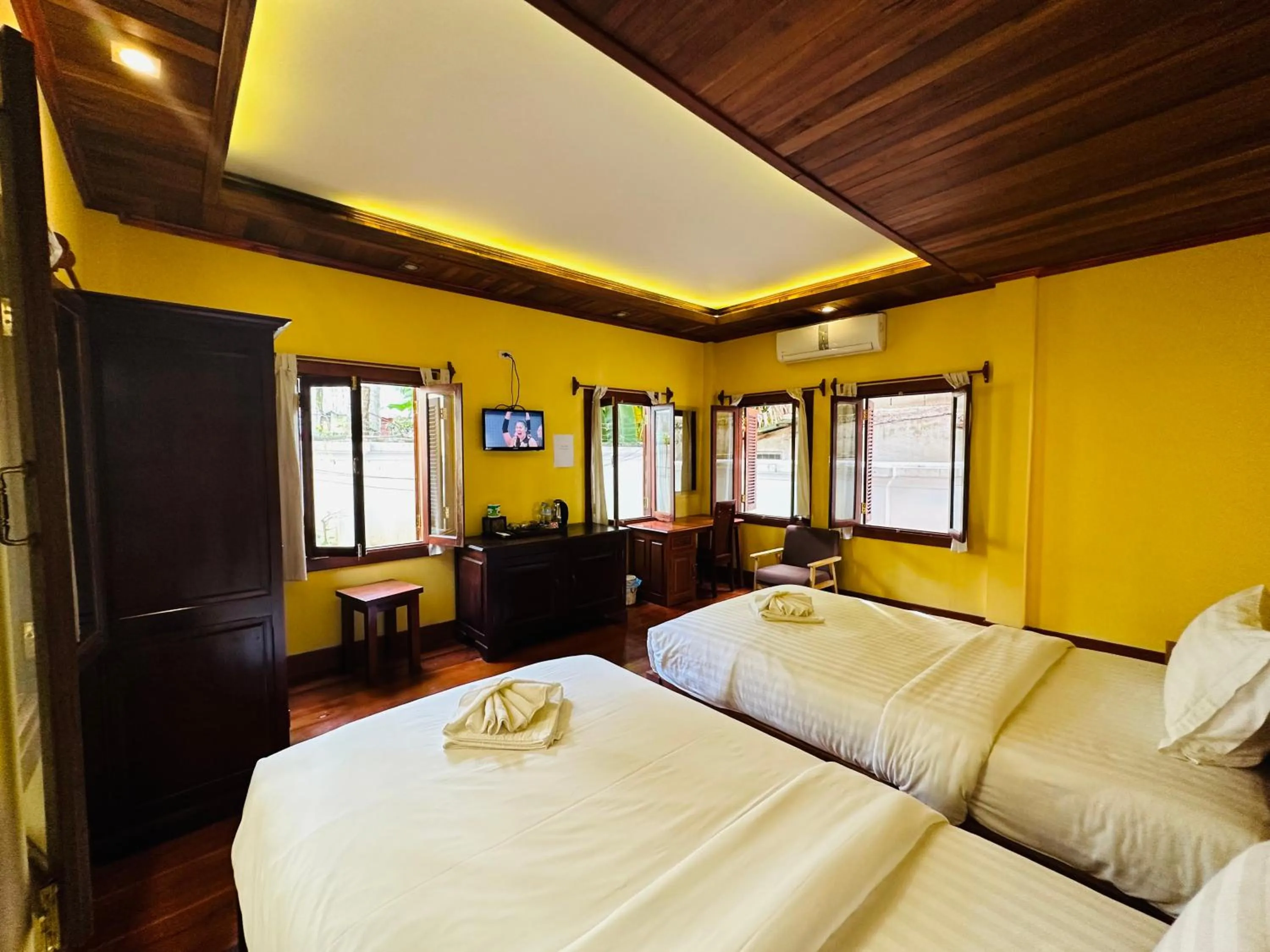 Bed in Villa Phonethip Mekong Riverside
