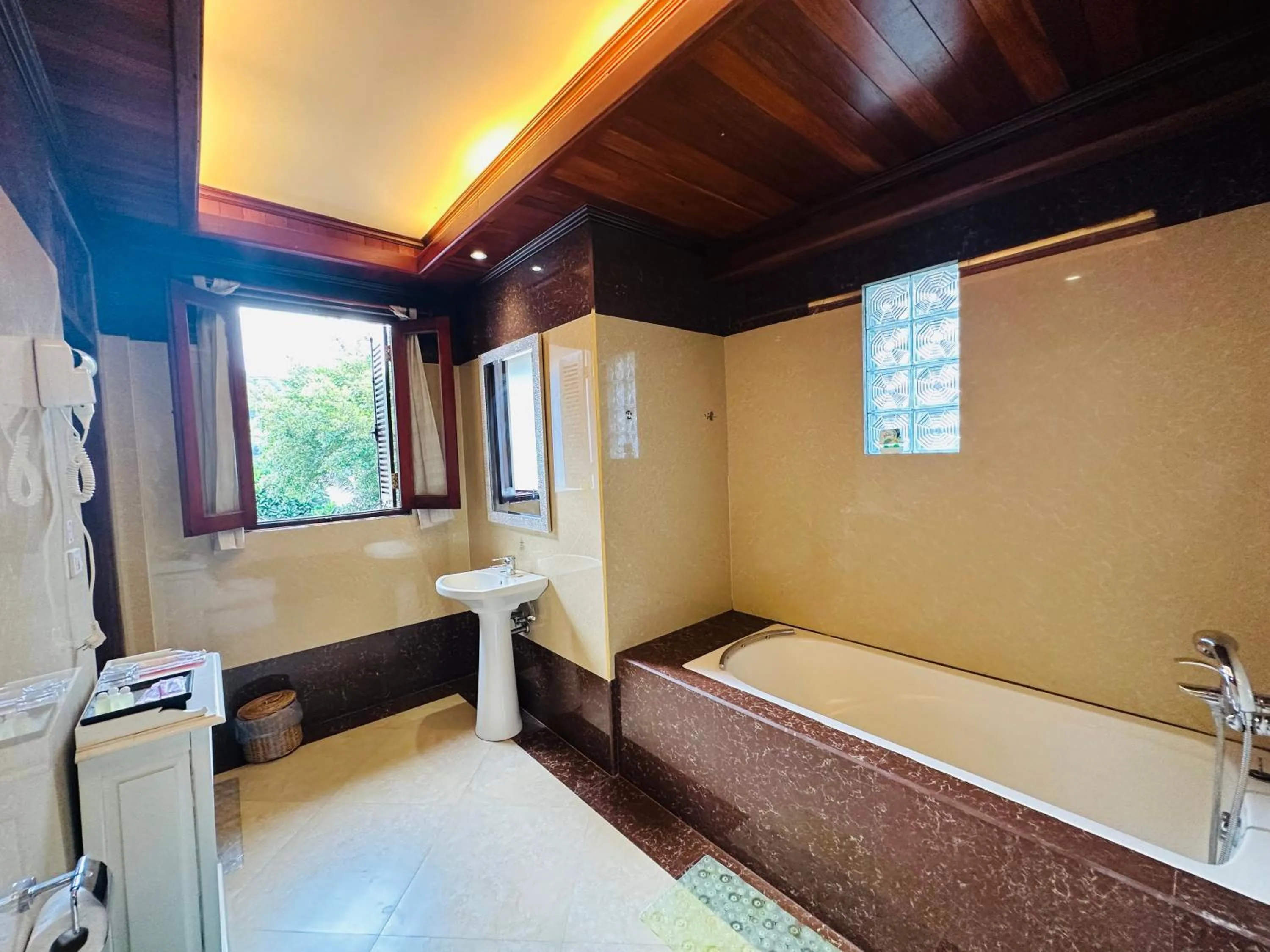 Bed in Villa Phonethip Mekong Riverside